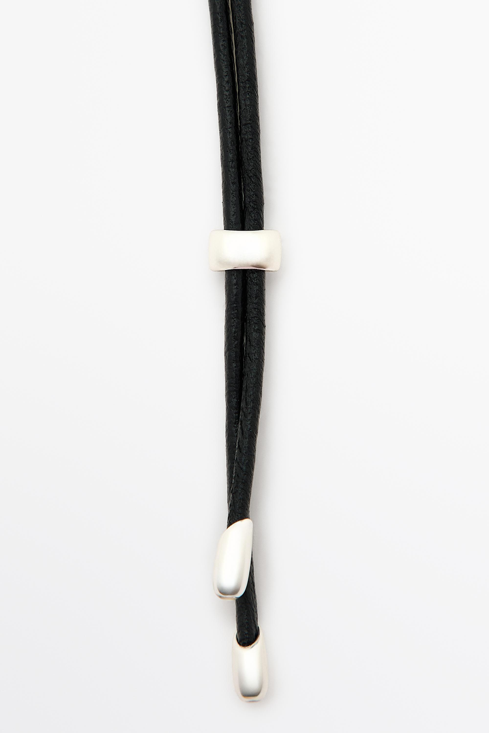 Leather cord necklace with oval pendant — GOLDEN