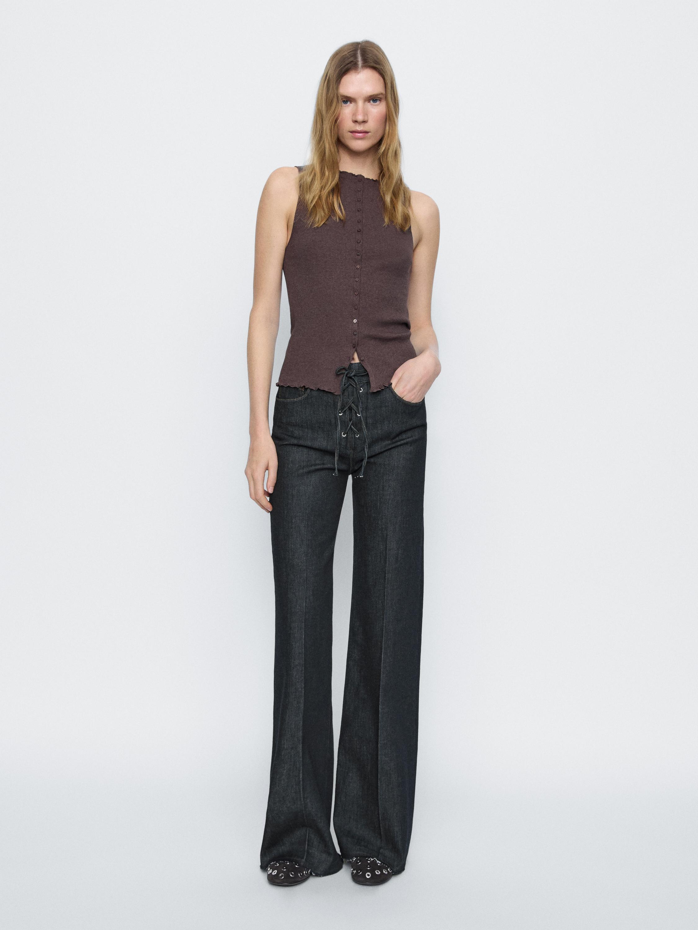 Flared jeans with tie detail