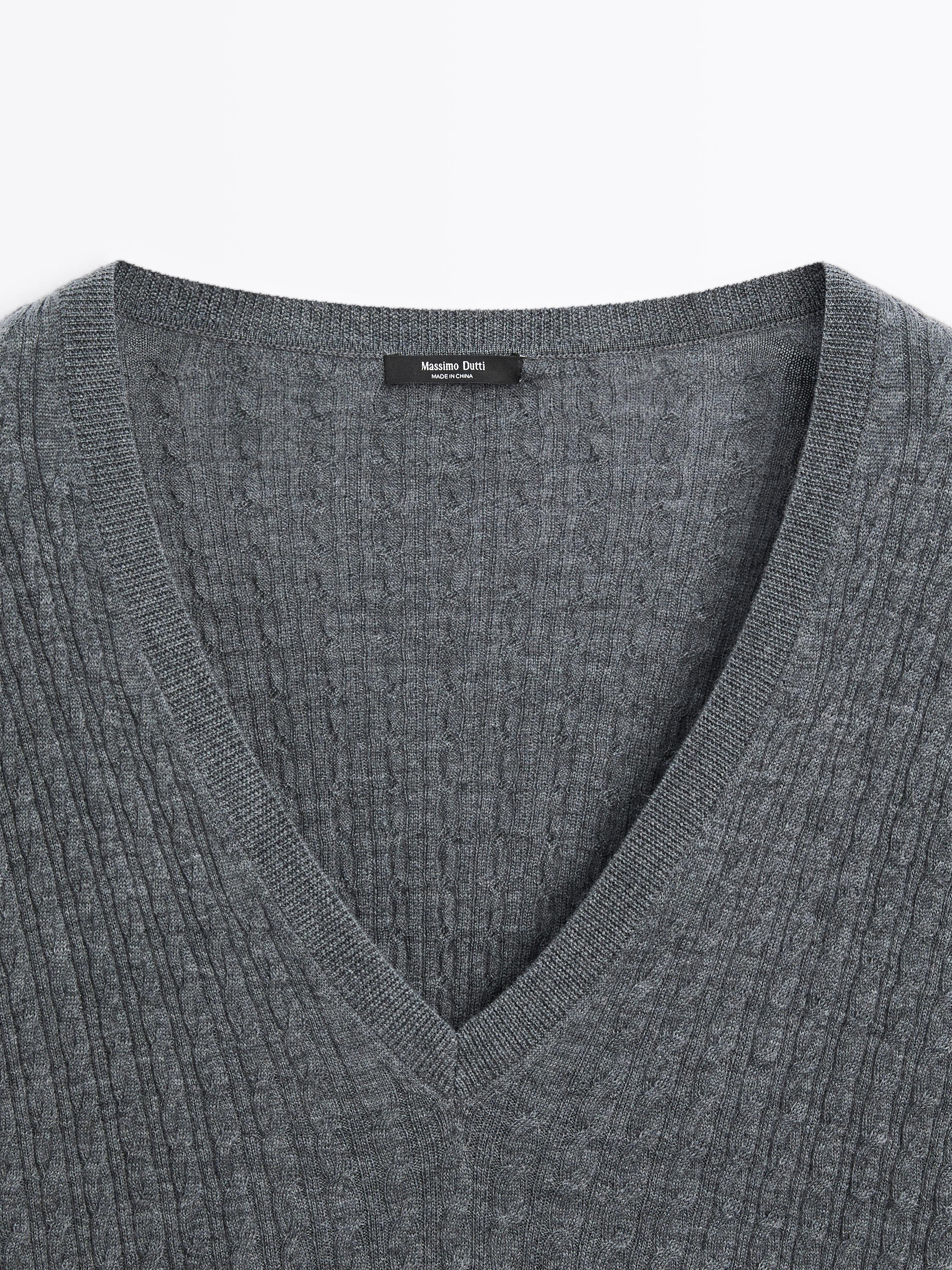 V-neck cable-knit sweater