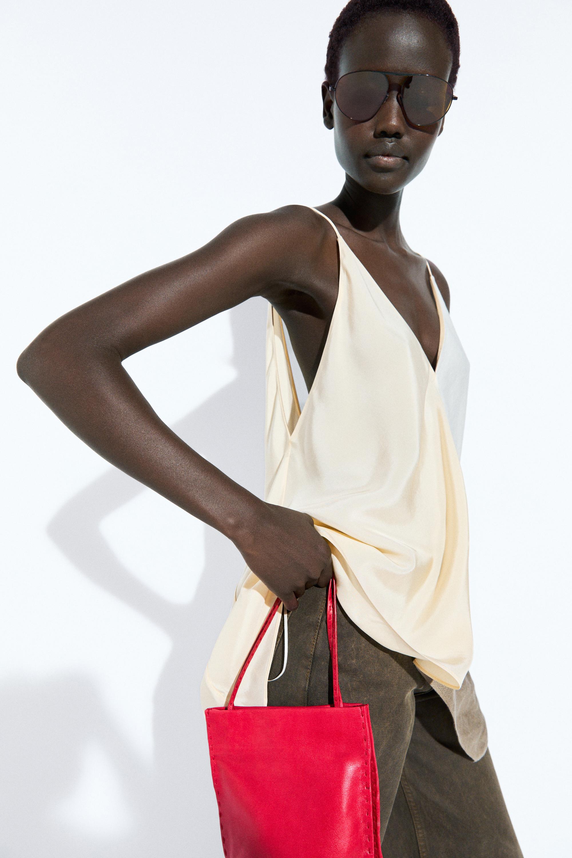 Asymmetric strappy flowing top — CREAM