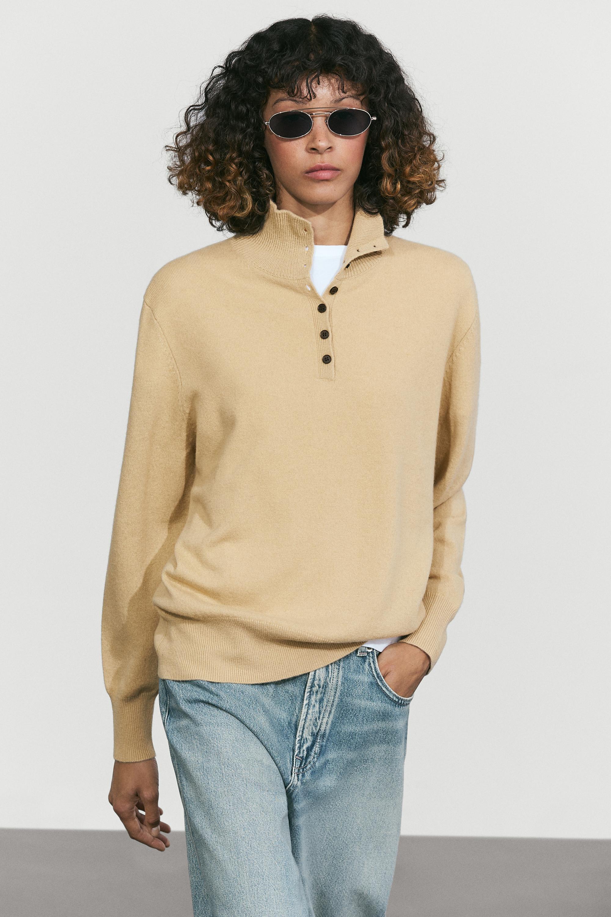 High neck knit sweater with button detail