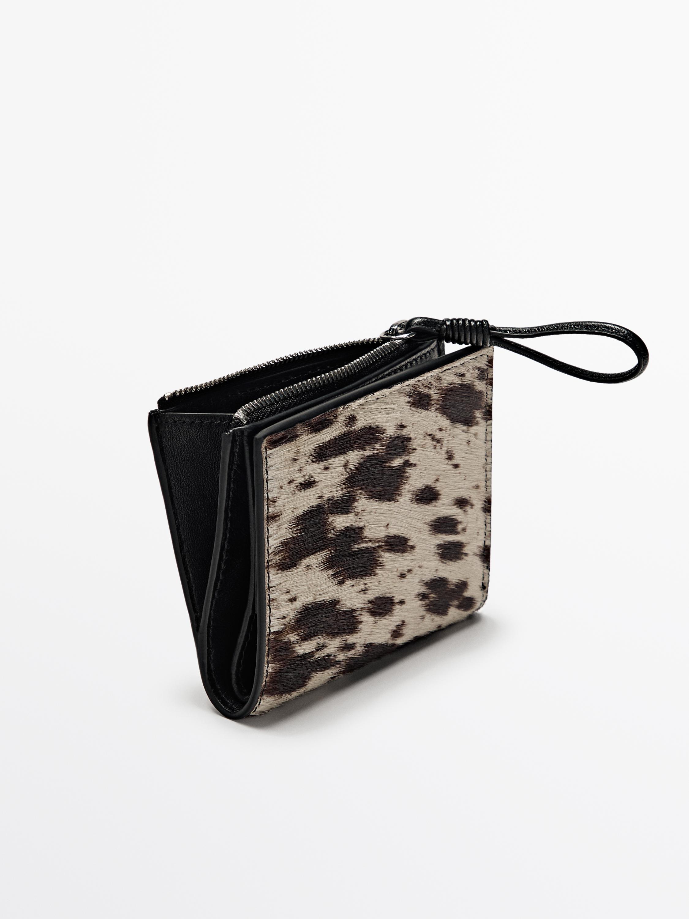 Cartera estampat animal pell