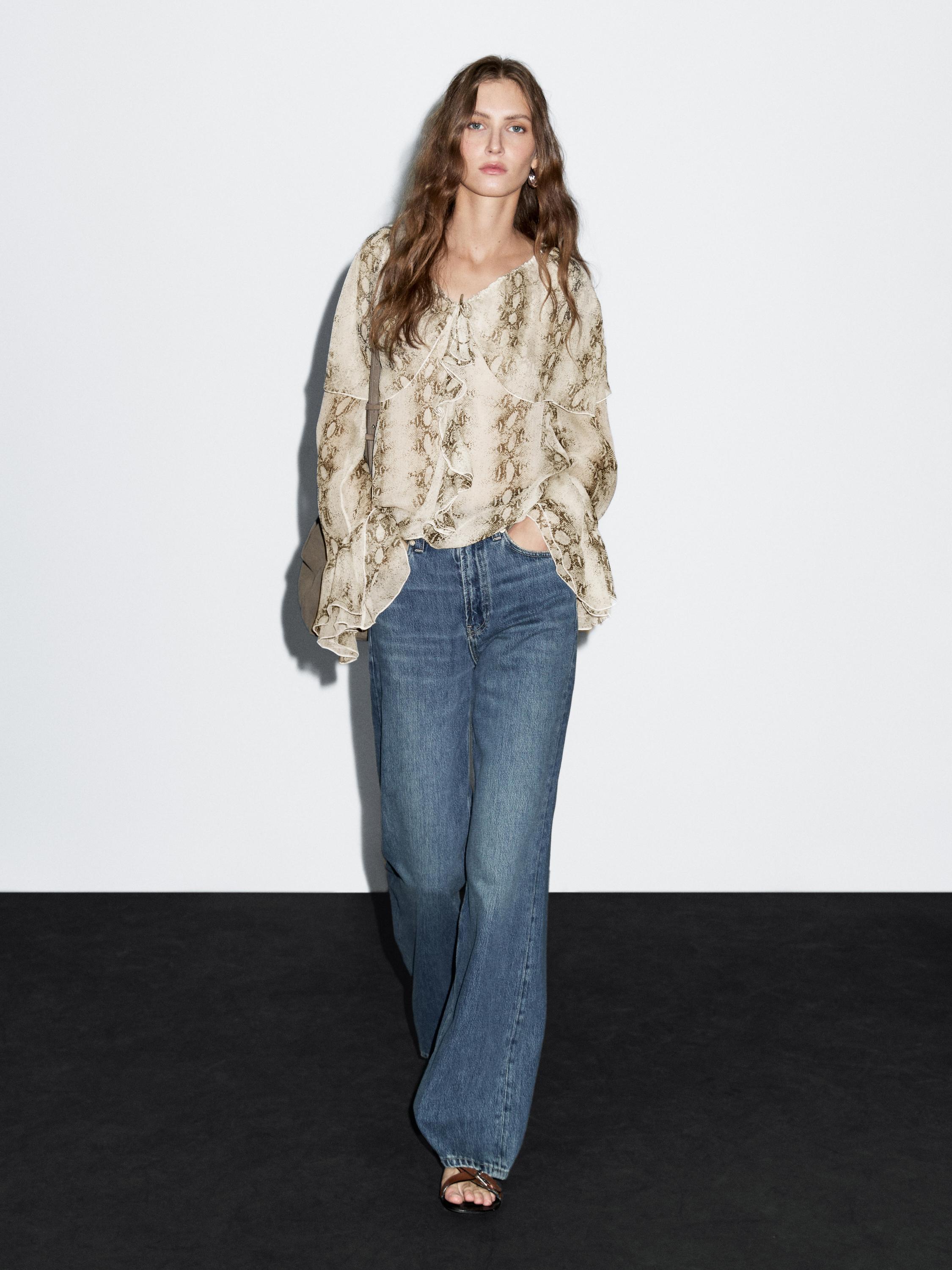 Snakeskin print blouse with ruffles