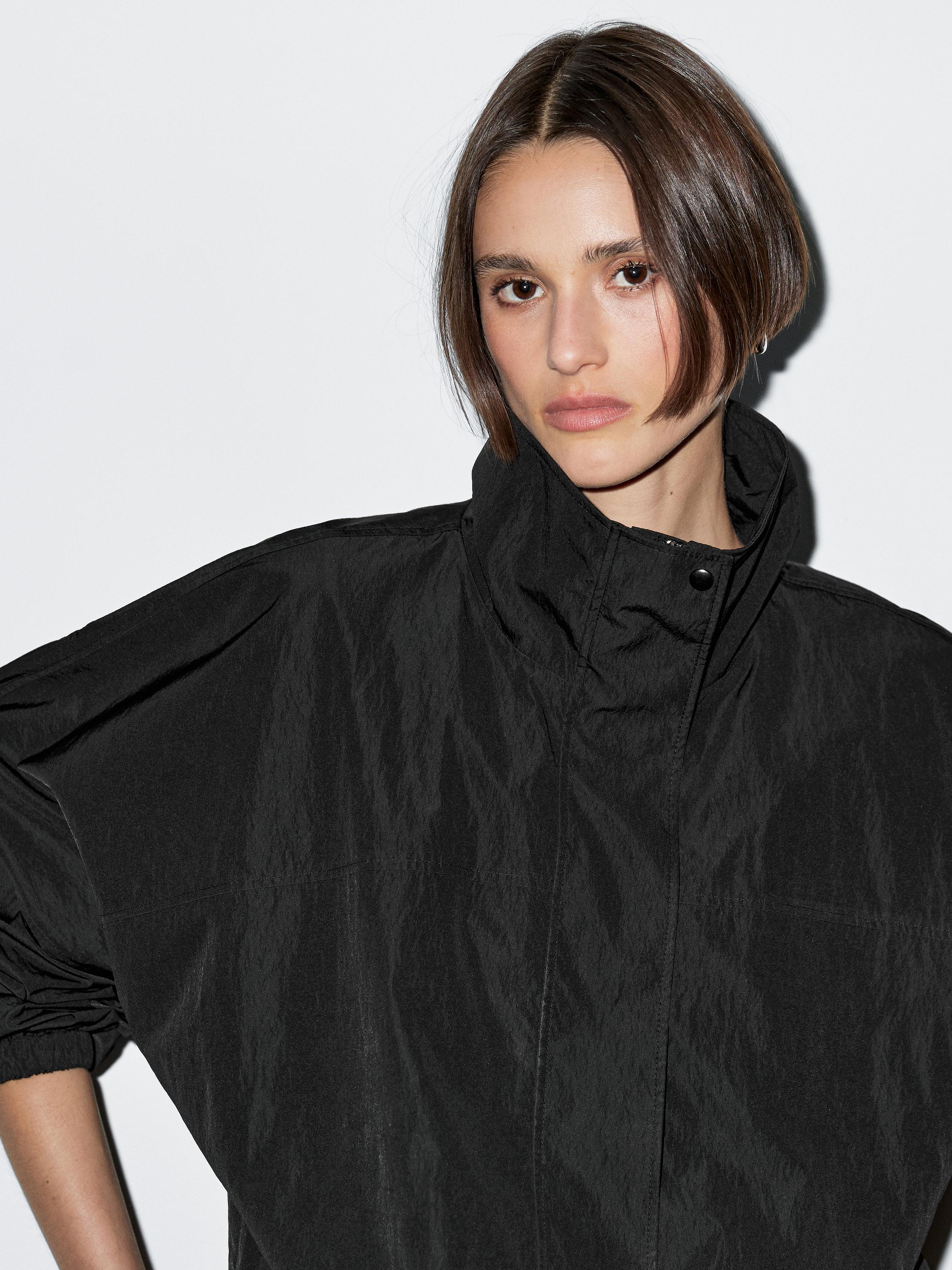 Veste technique bouffante à col montant