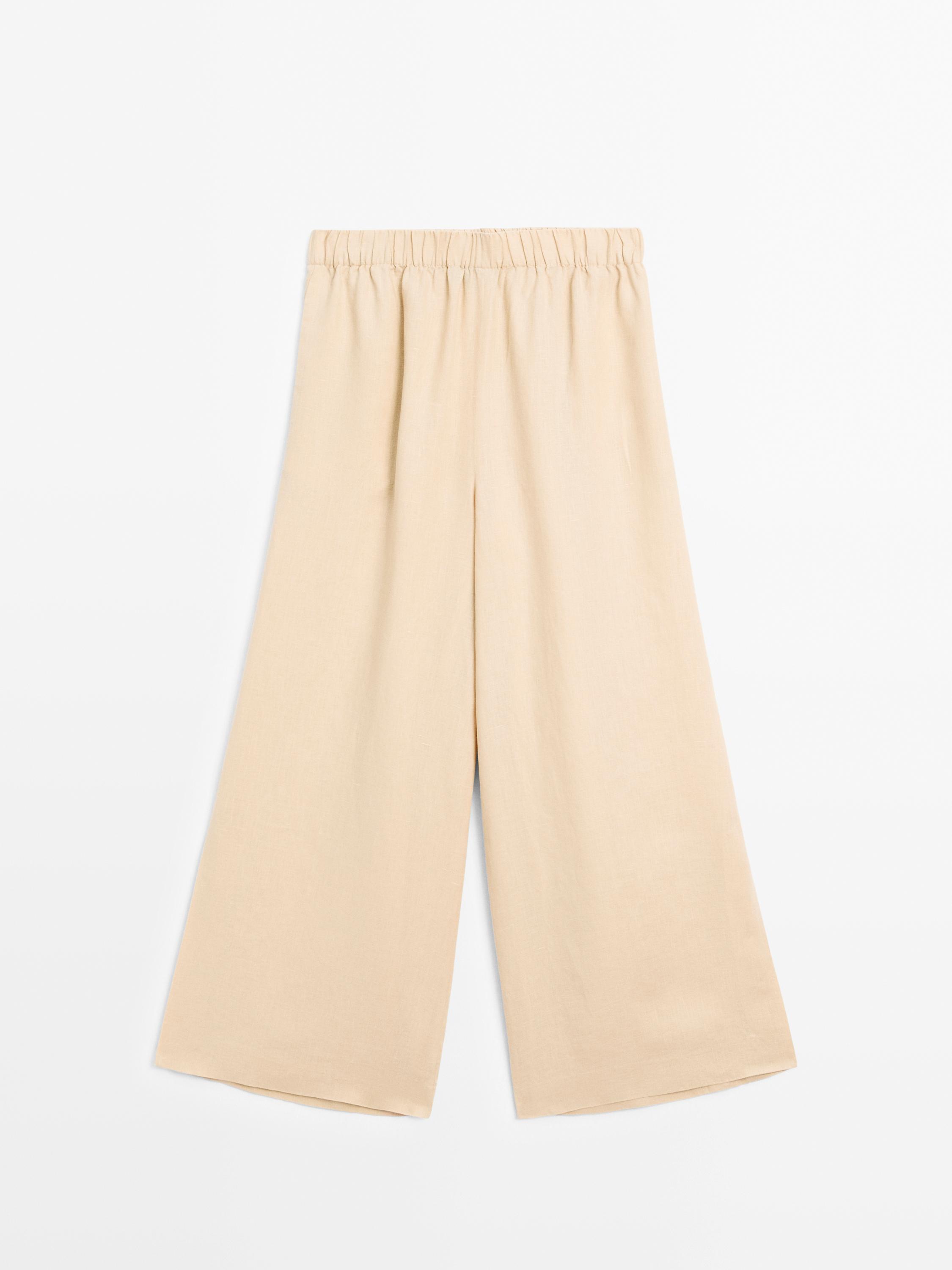 Flowing 100% linen trousers with elastic detail