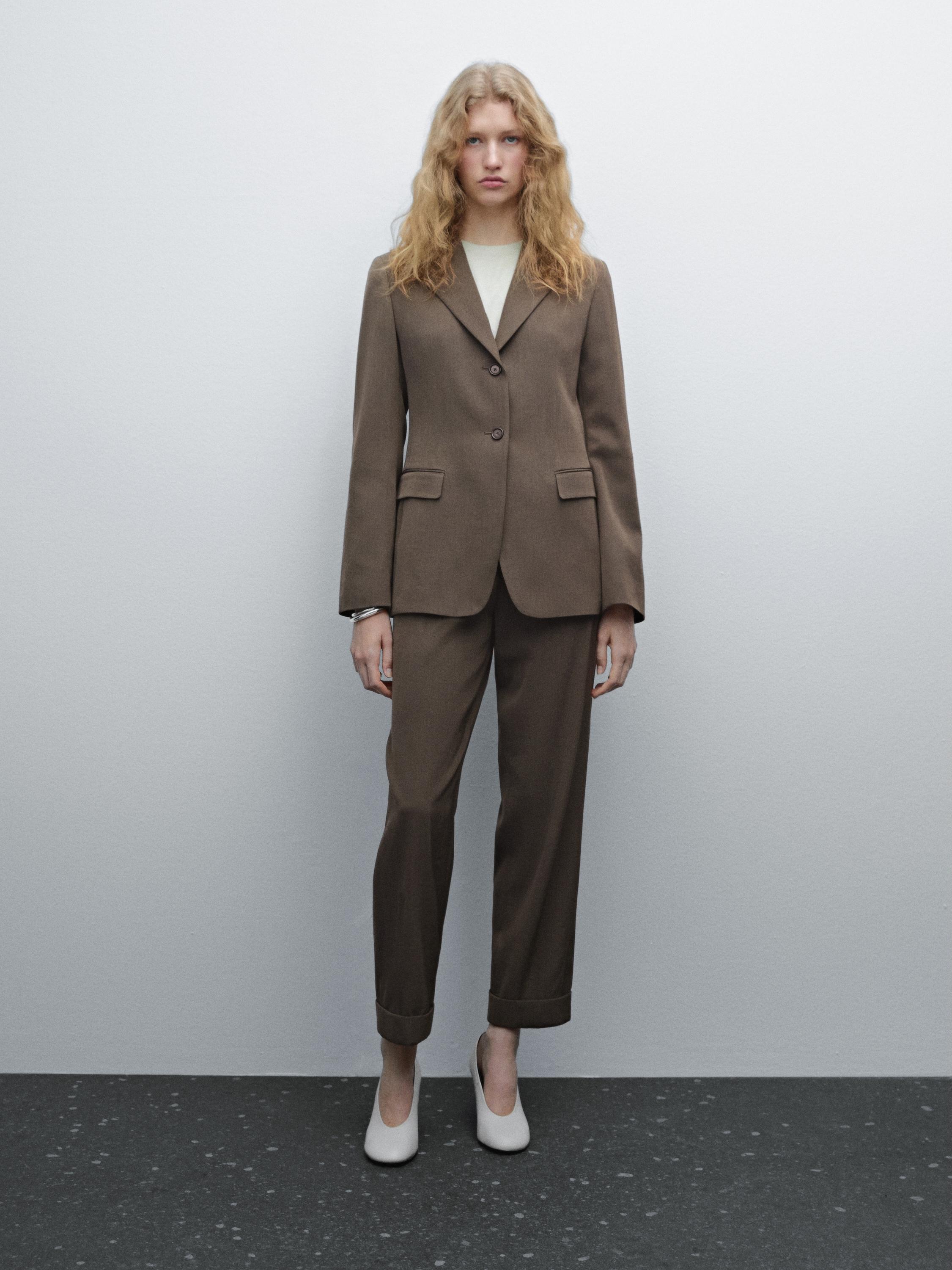 Suit trousers with turn-up hems