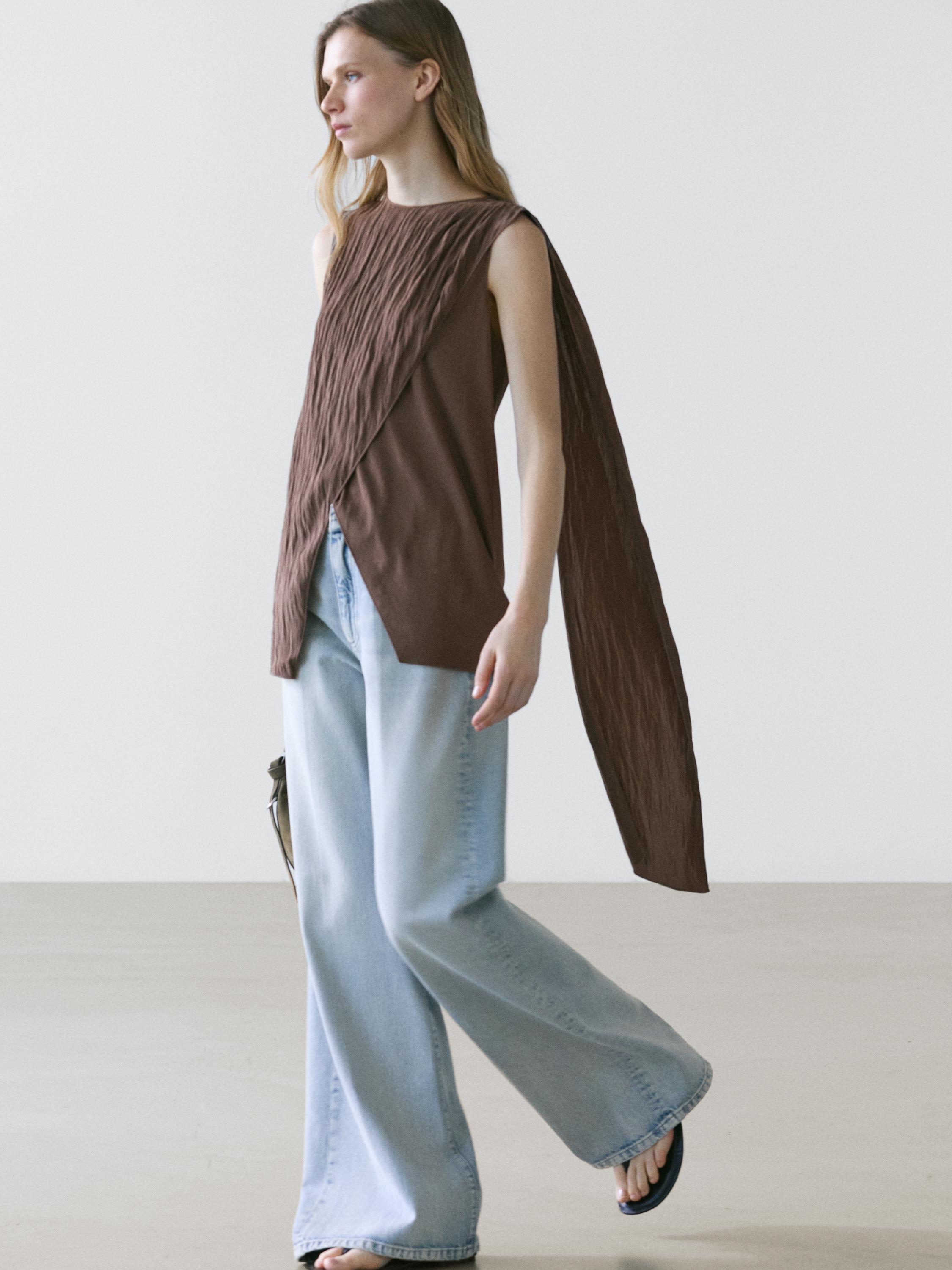 Cross-over top with scarf detail on the shoulder