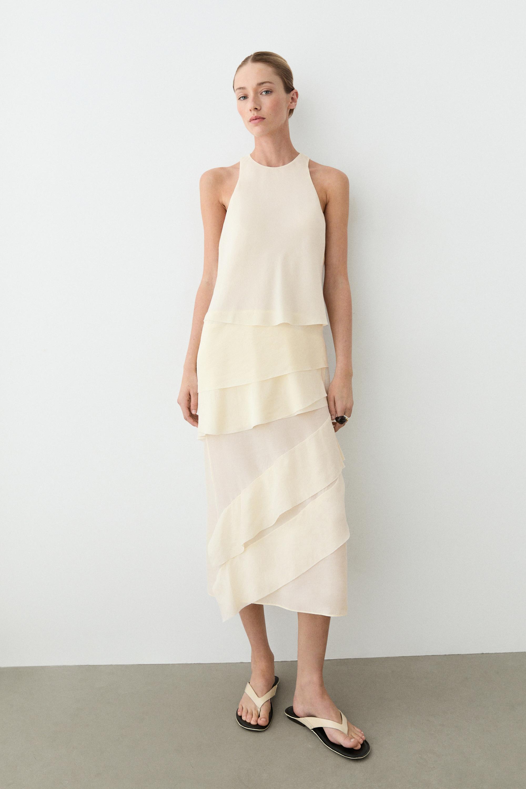 Flowing midi dress with ruffles — CREAM