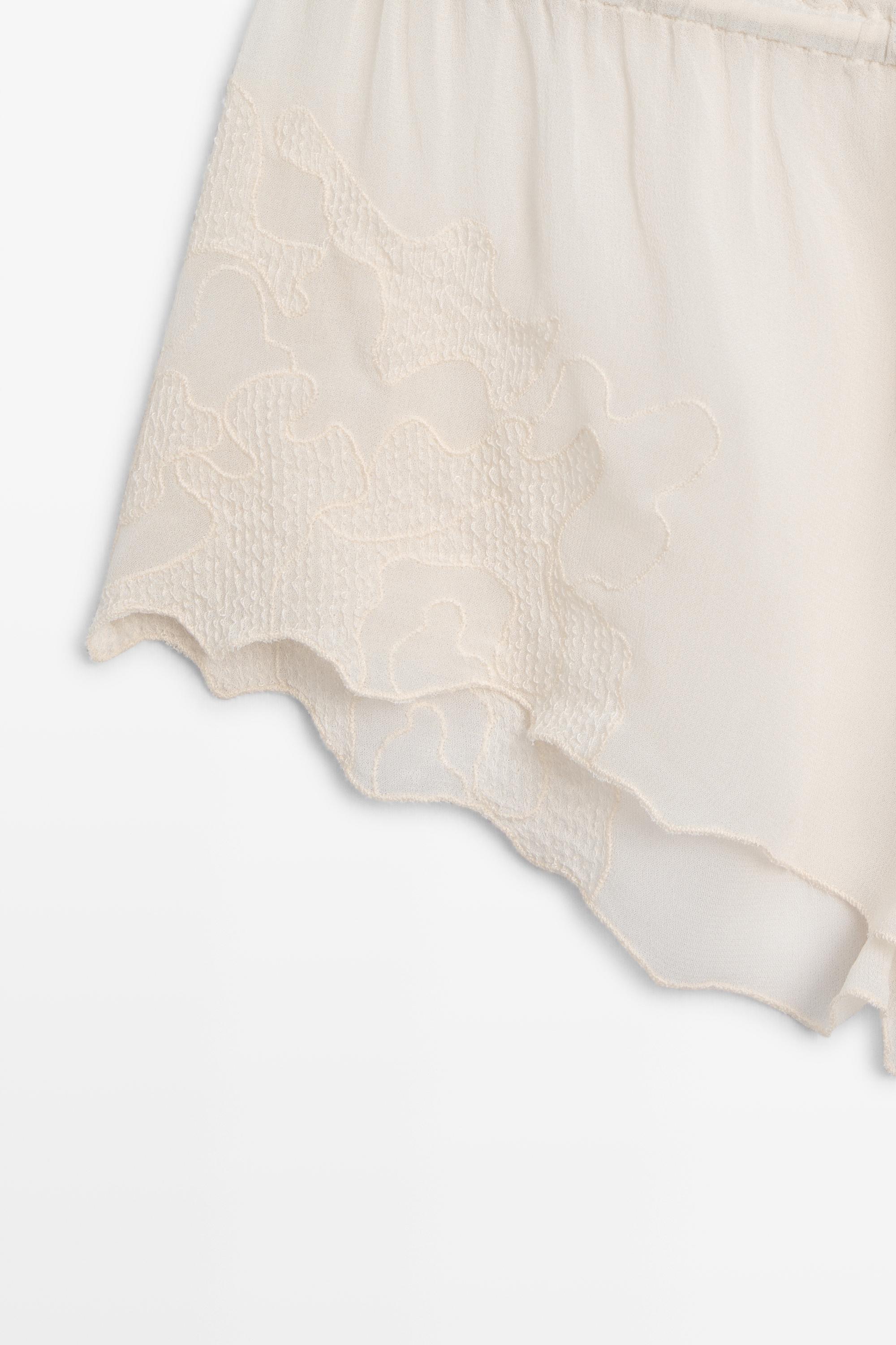 Flowing shorts with embroidered detail — CREAM