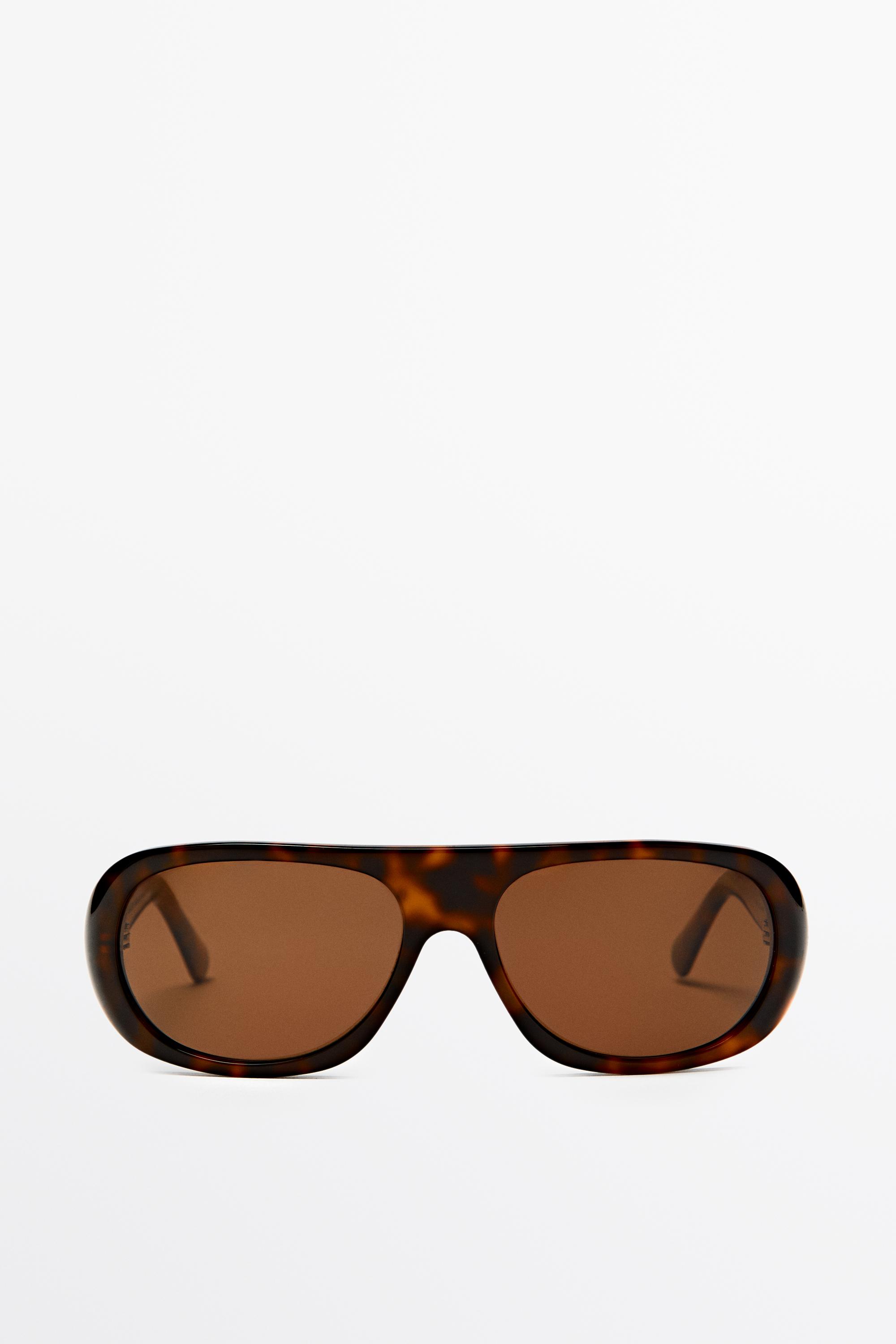 Oval tortoiseshell-effect sunglasses — BROWN
