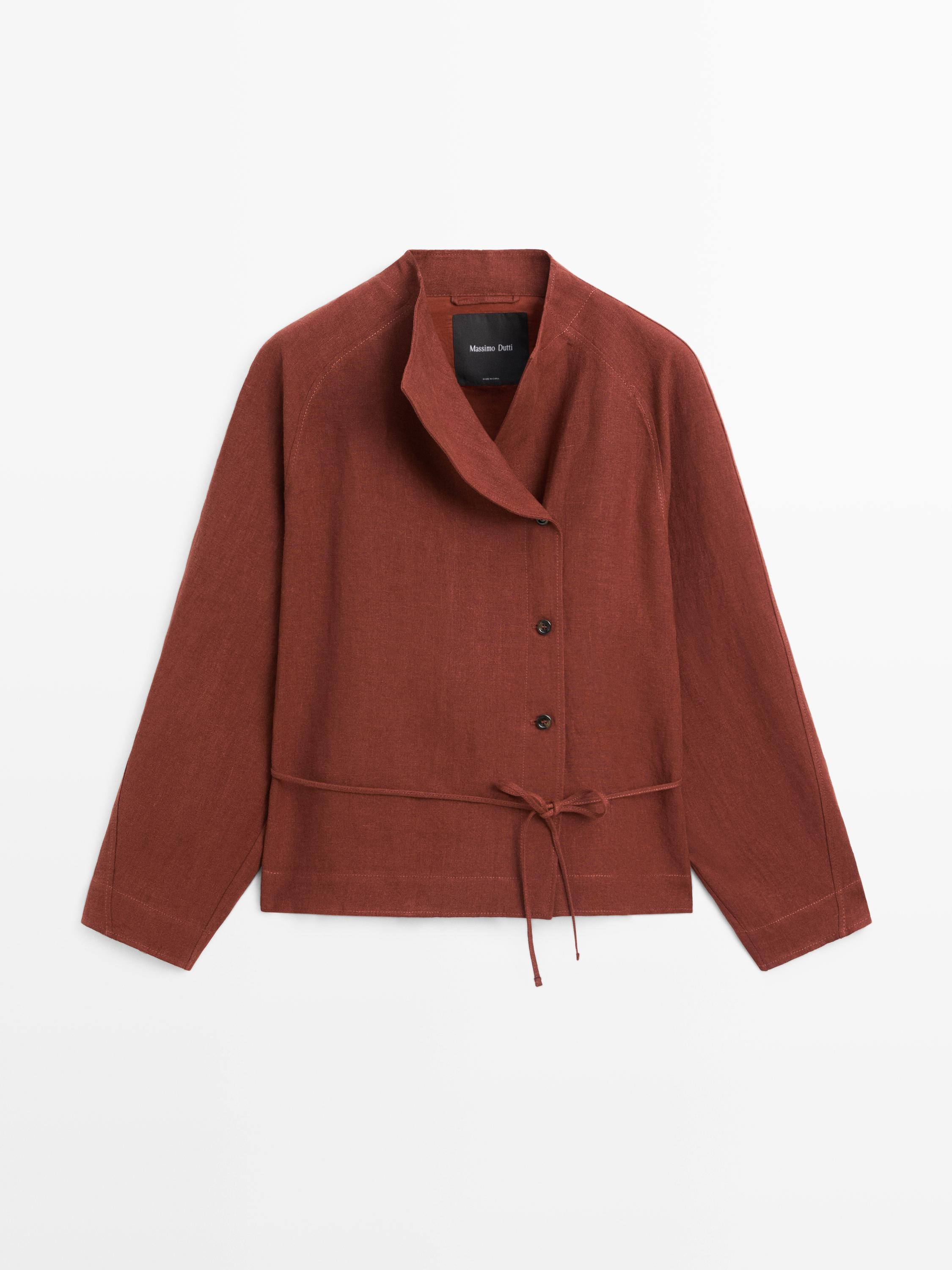 Front view of a brick kimono with buttons and a tie at the waist.