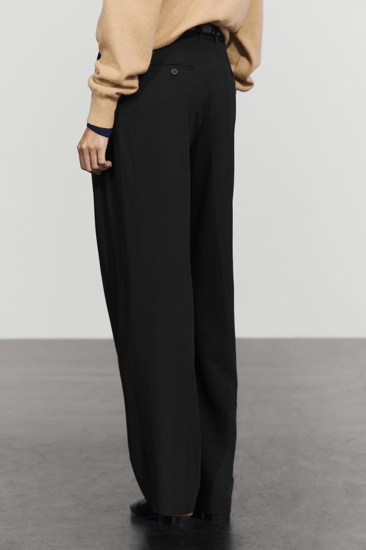Flowing pleated pants — BLACK