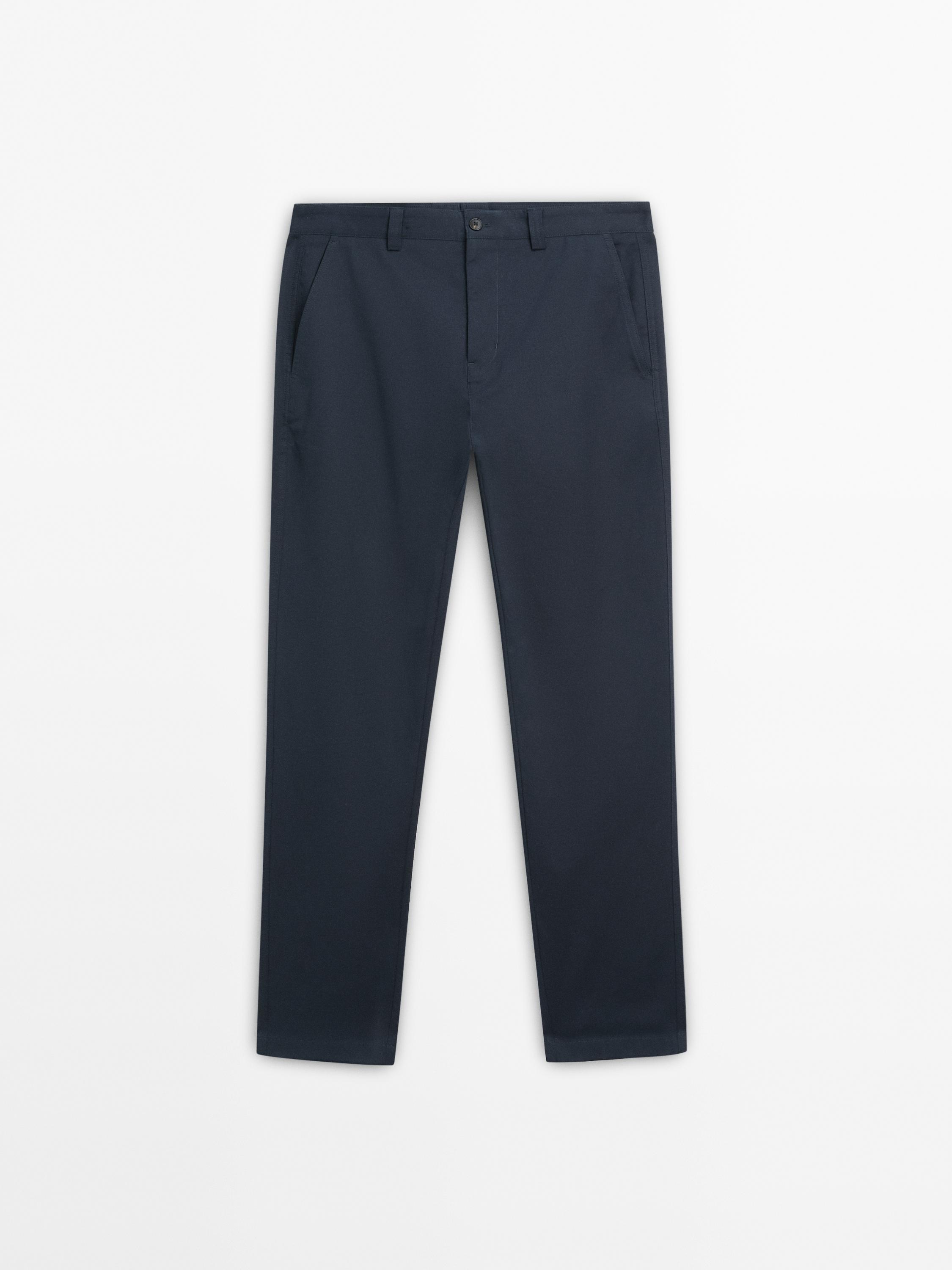 Kalhoty slim fit z bavlněné směsi.