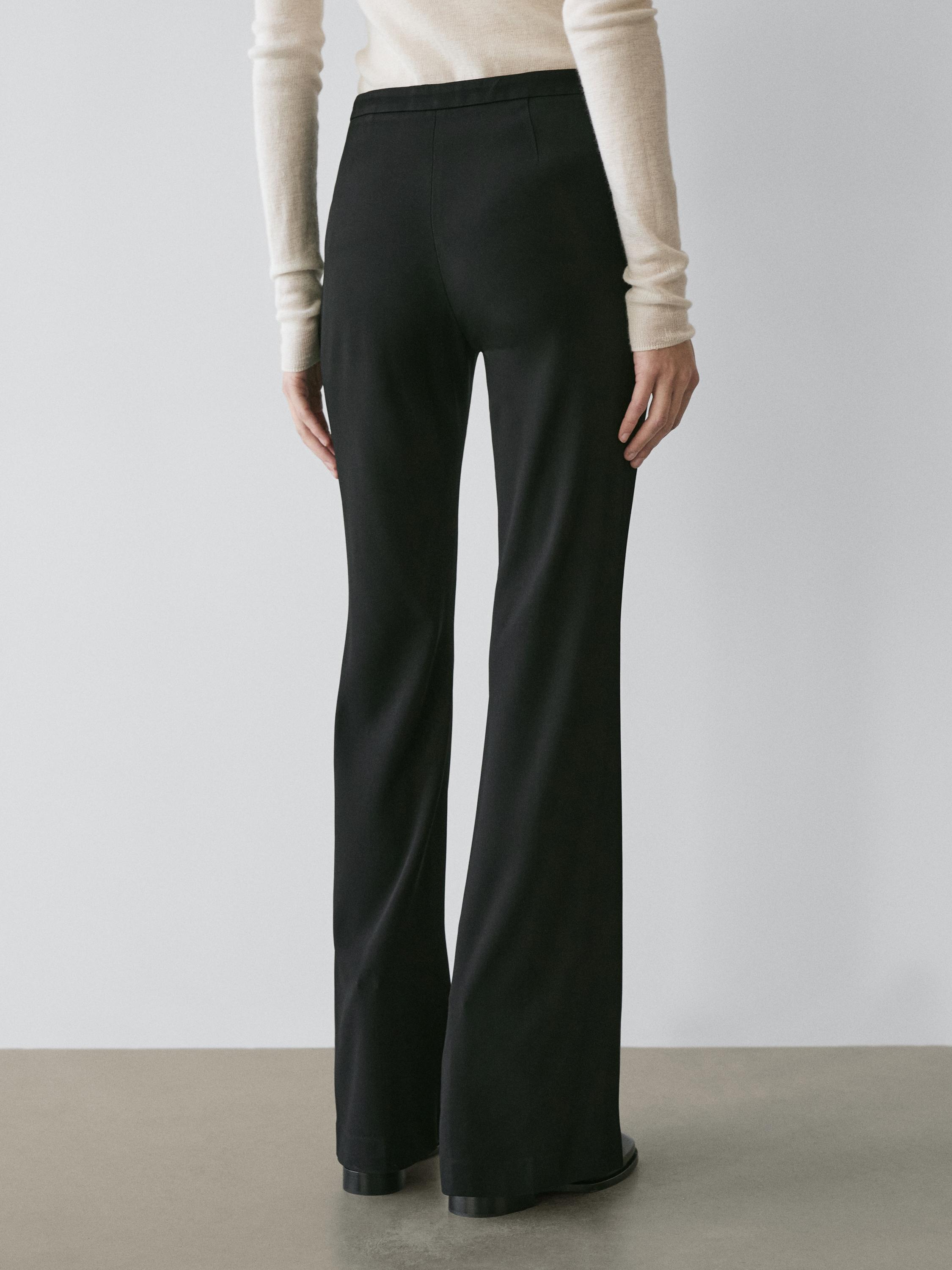 Flared trousers with pocket — BLACK