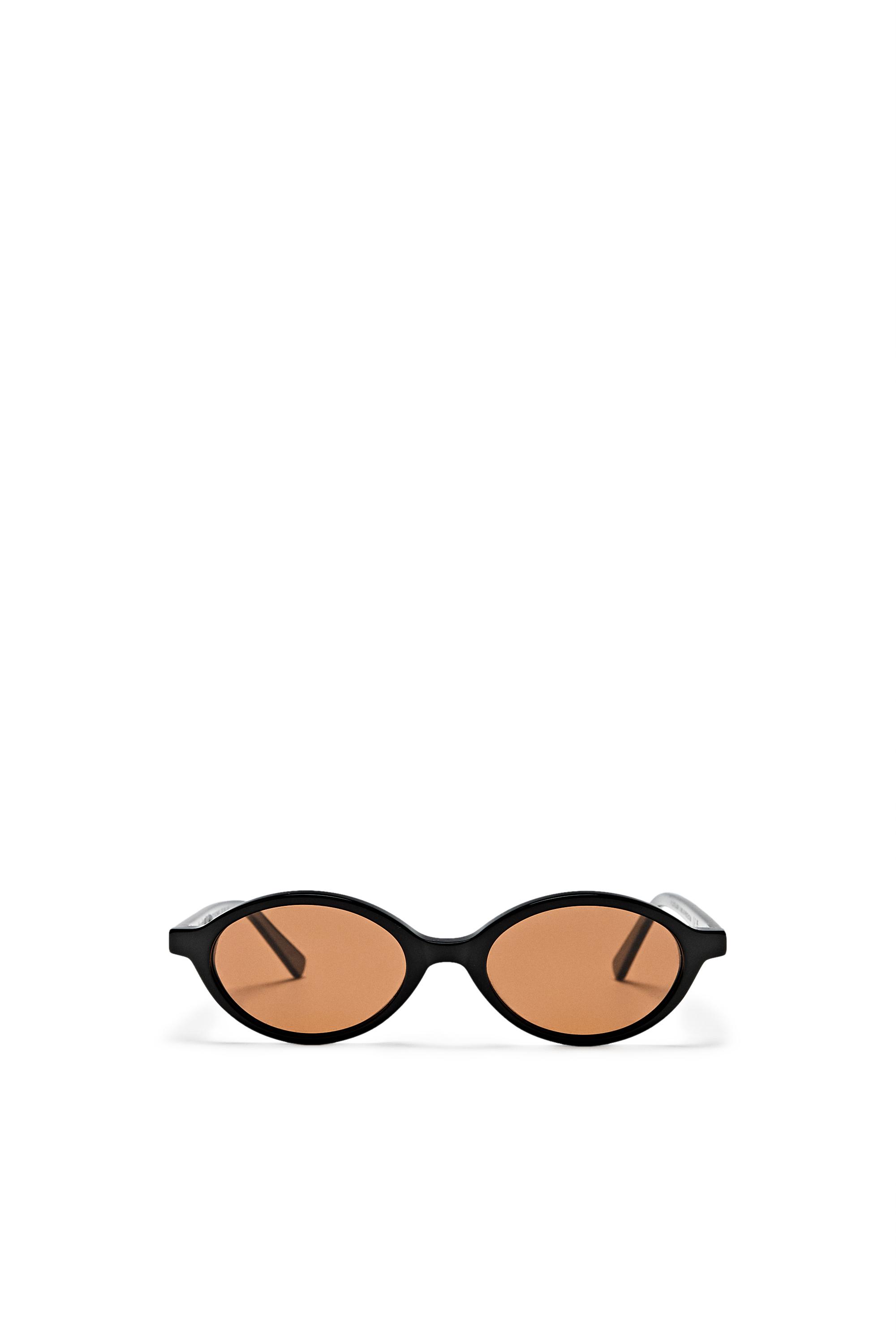 Oval sunglasses — BLACK