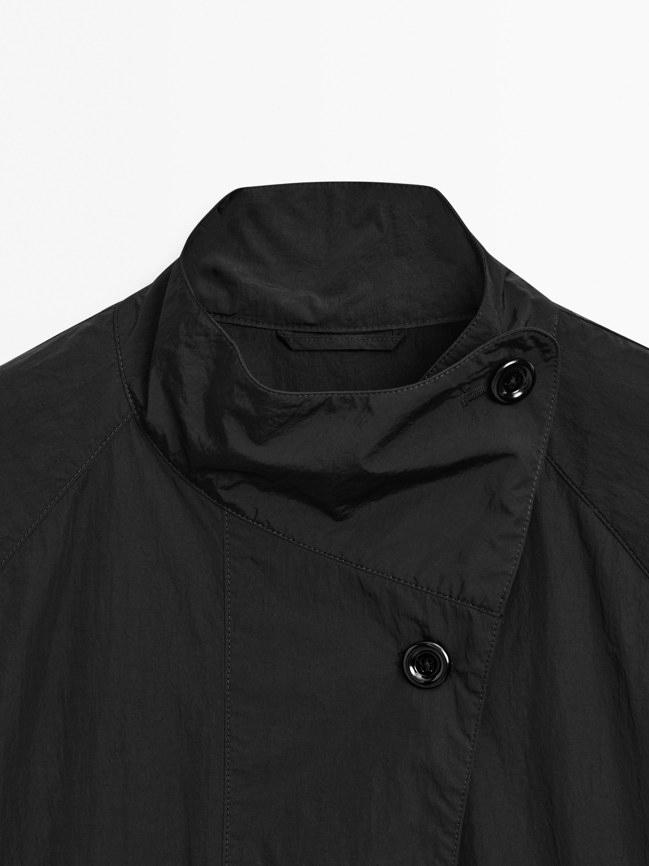 Oversize flowing trench coat in water-repellent fabric