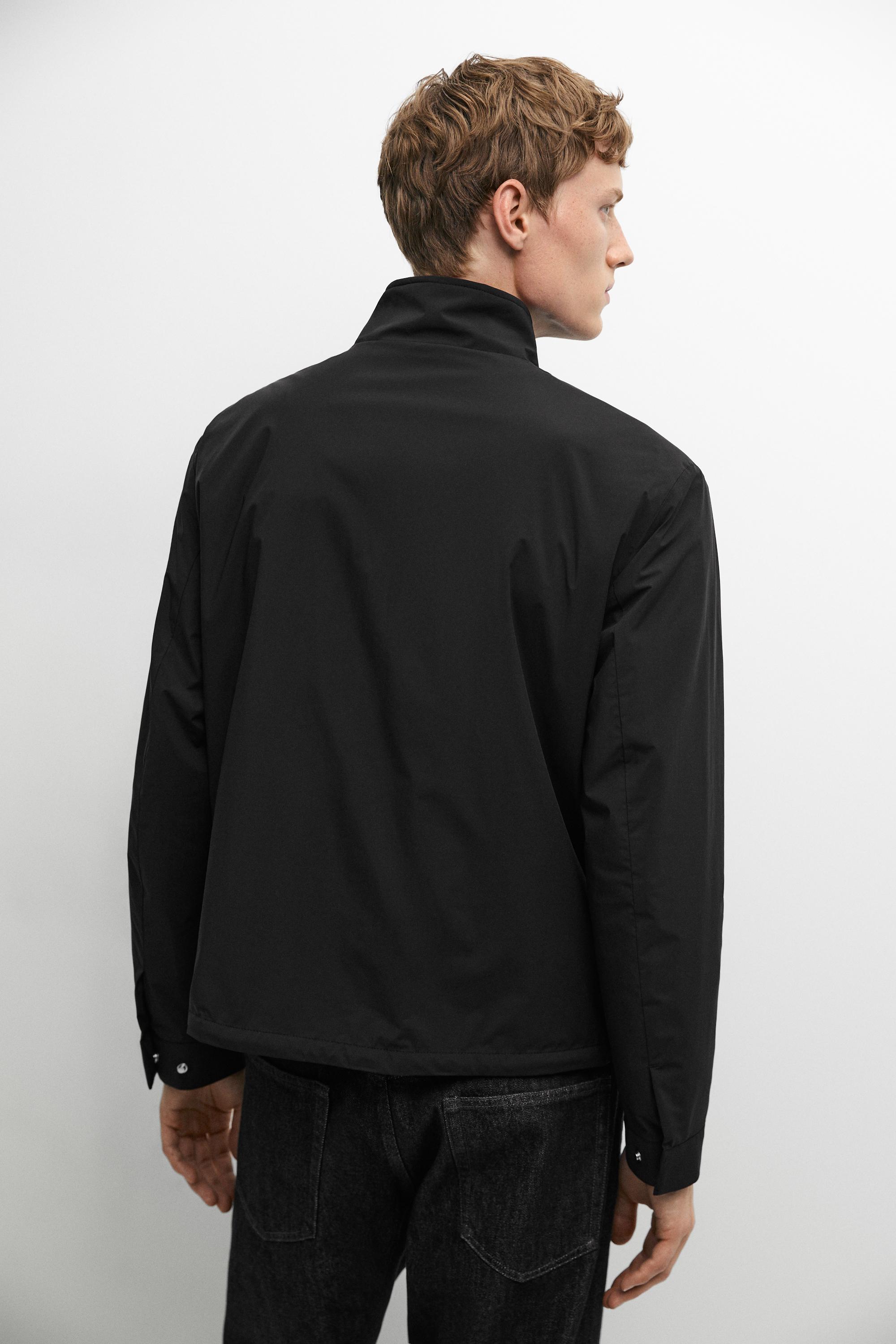 Technical jacket with pocket detail — BLACK