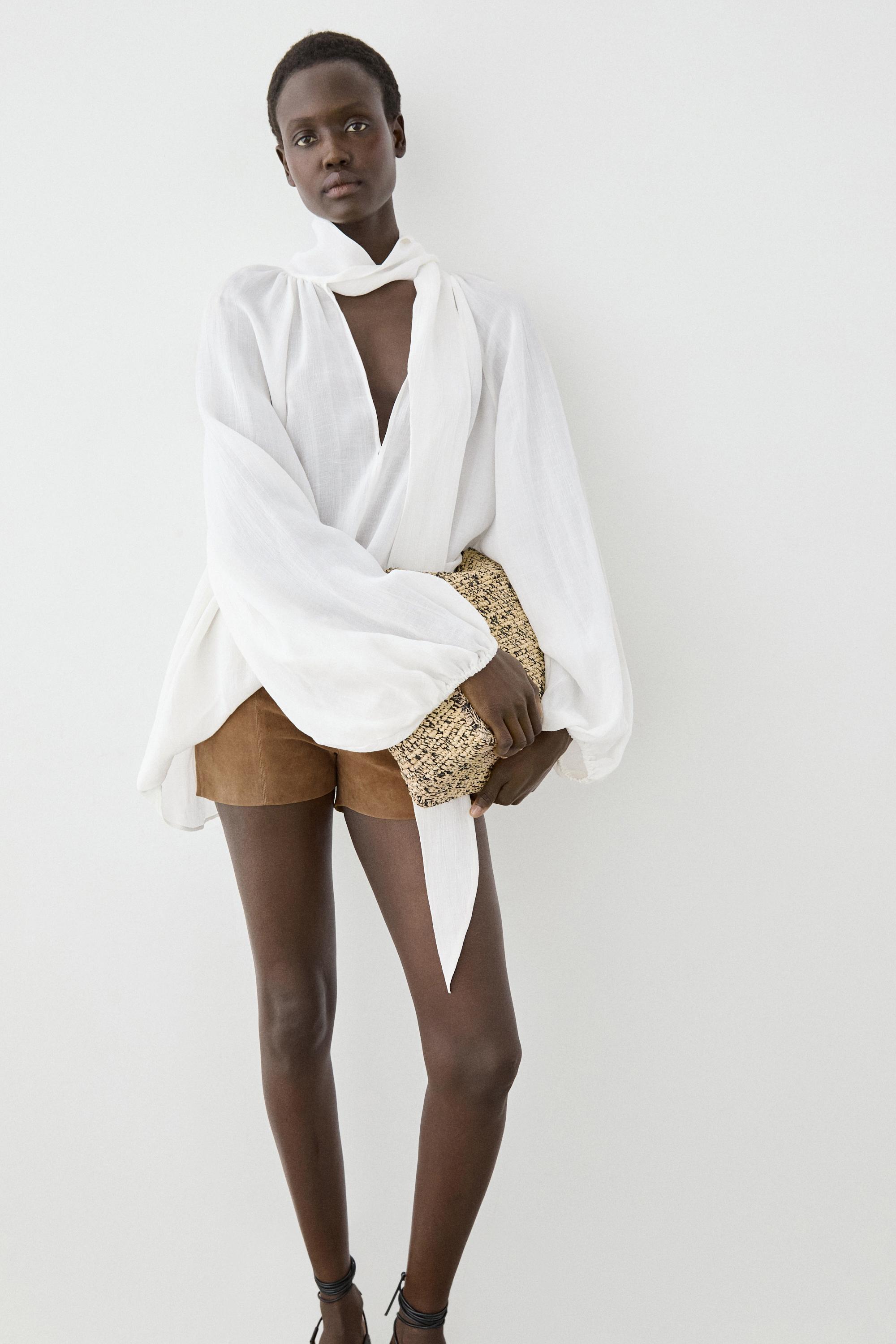 Flowing V-neck blouse with tie — WHITE