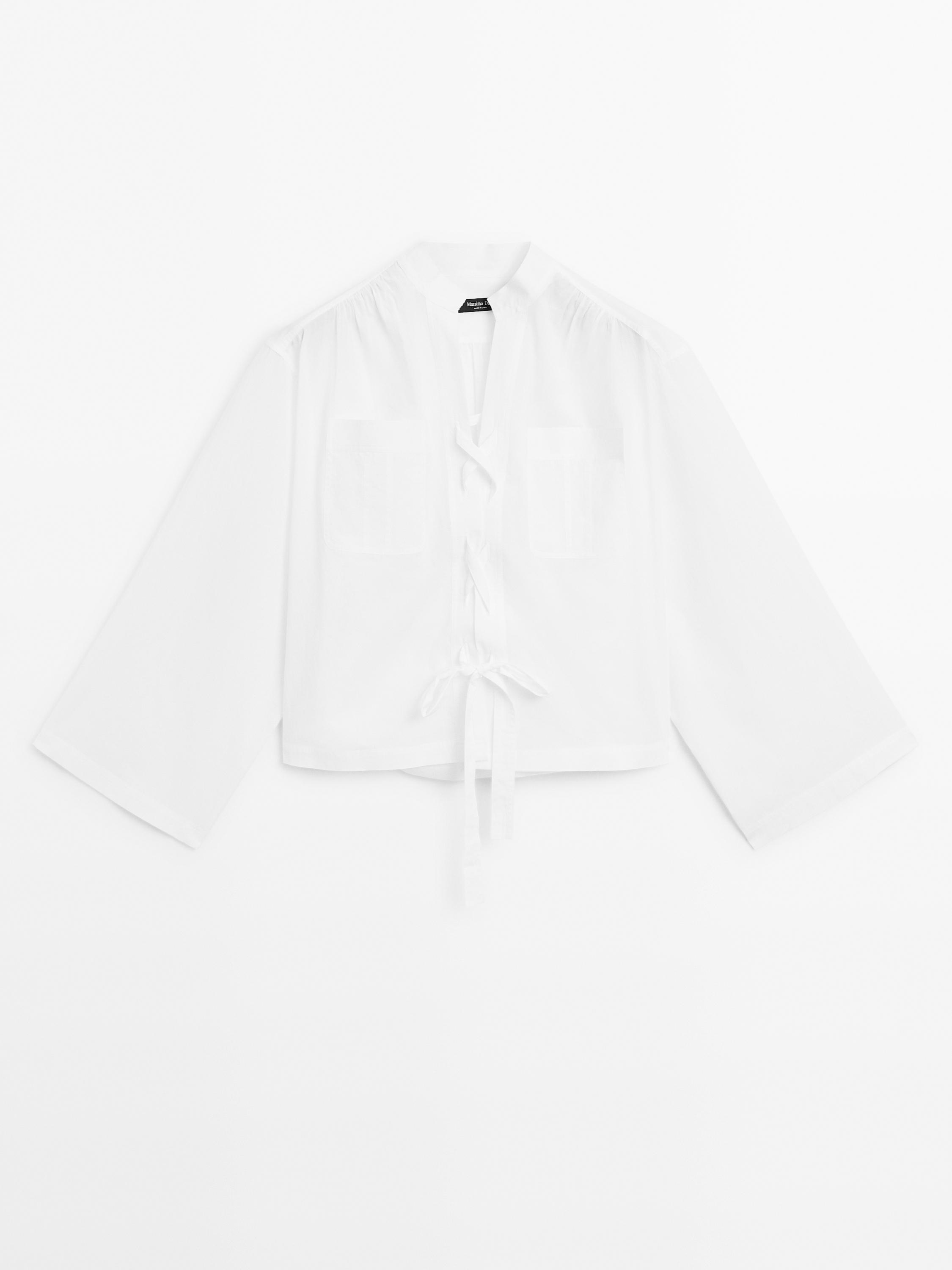 Stand collar blouse with tie detail
