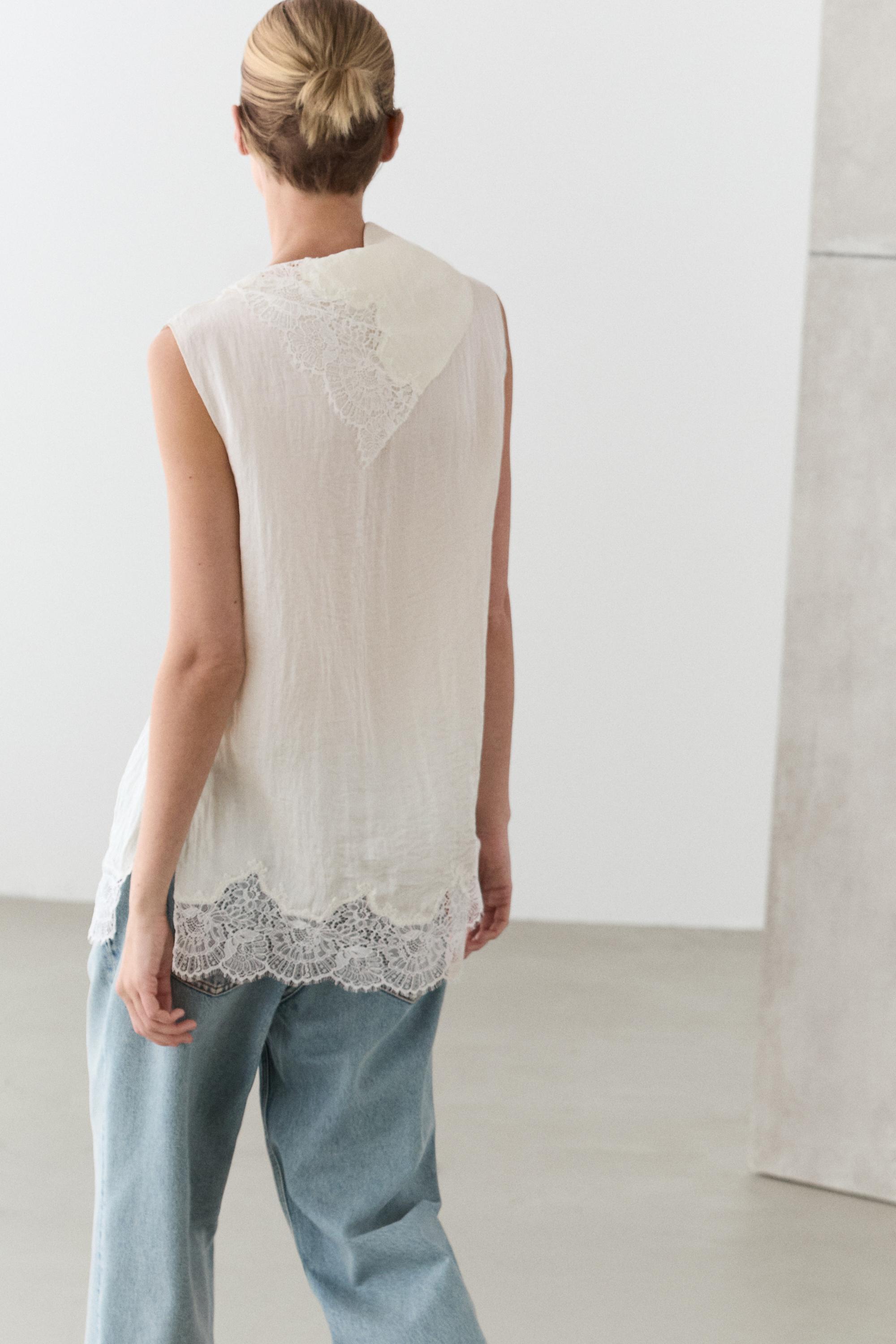 Asymmetric roll neck top with lace detail — CREAM