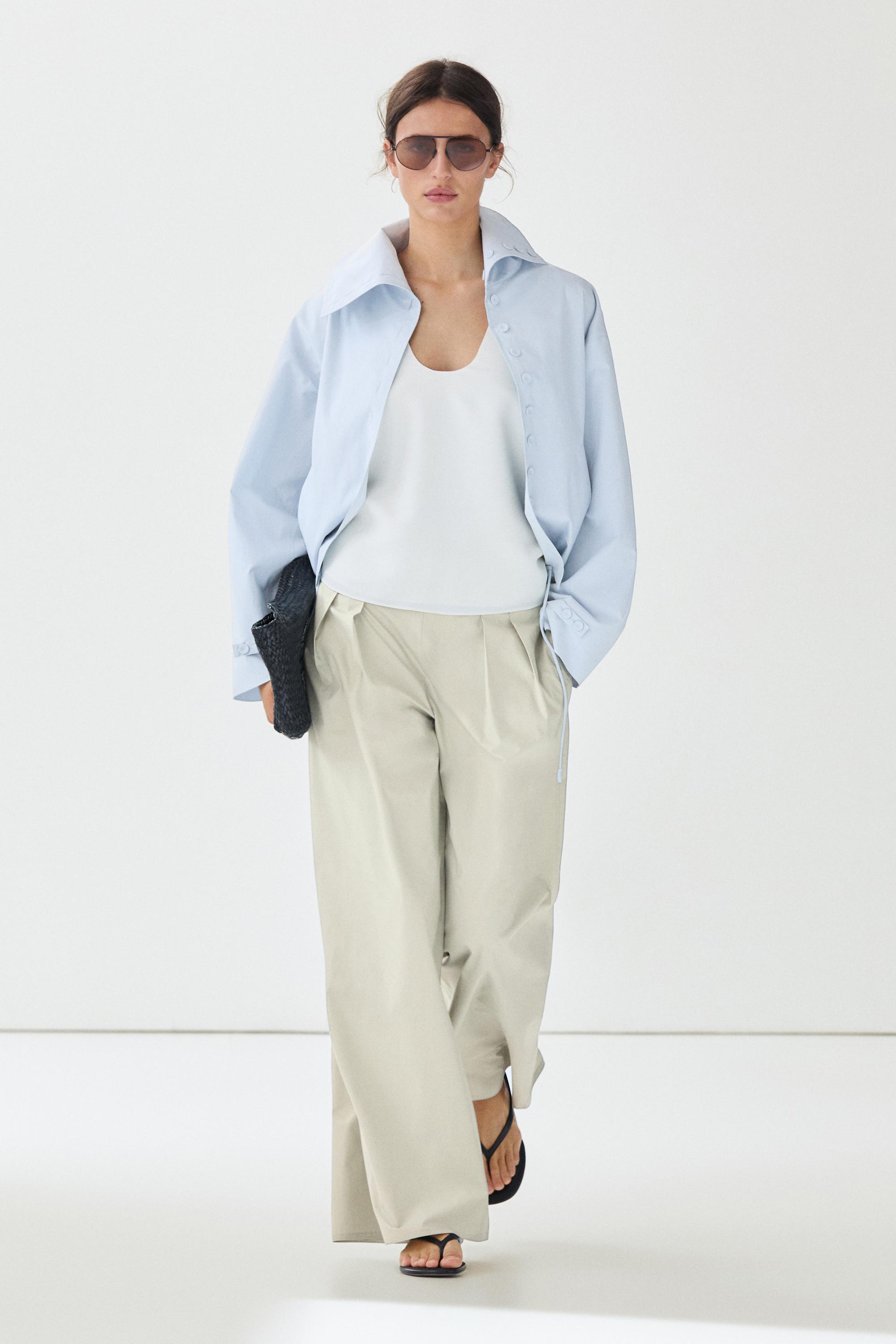 Wide-leg pants with pleated sash detail
