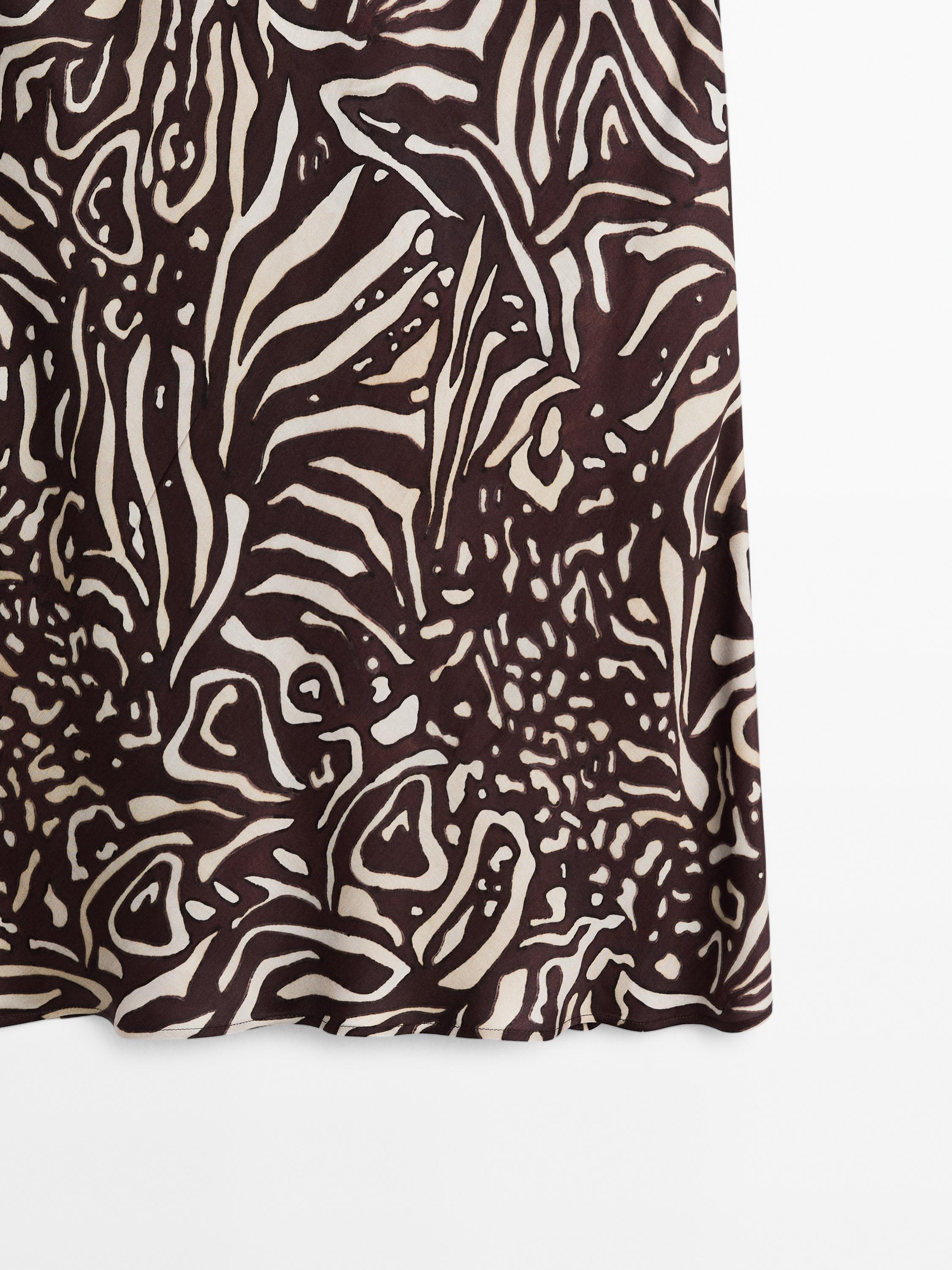 Saia midi fluida com animal print