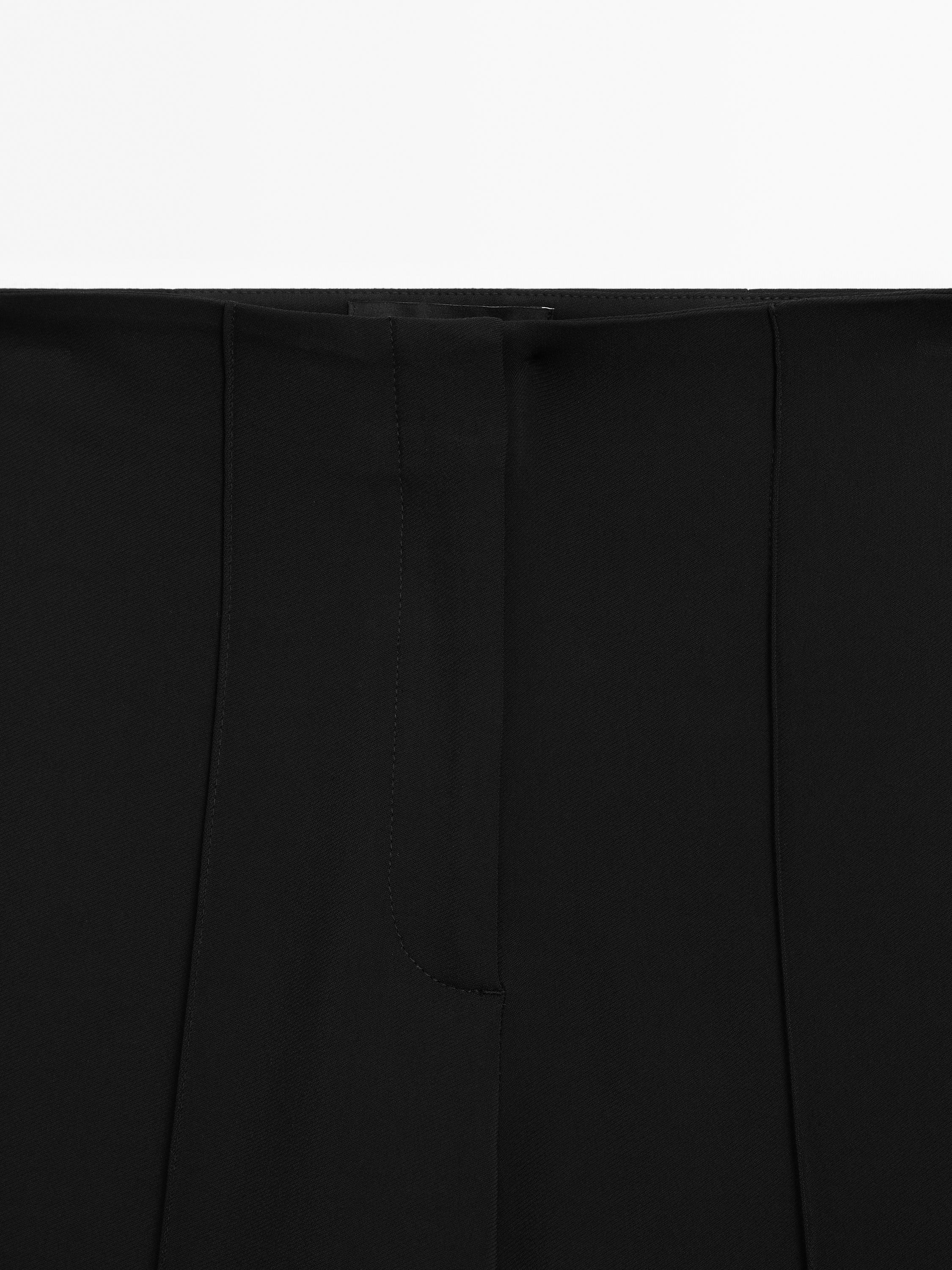 Pantaloni flare fit cerniera