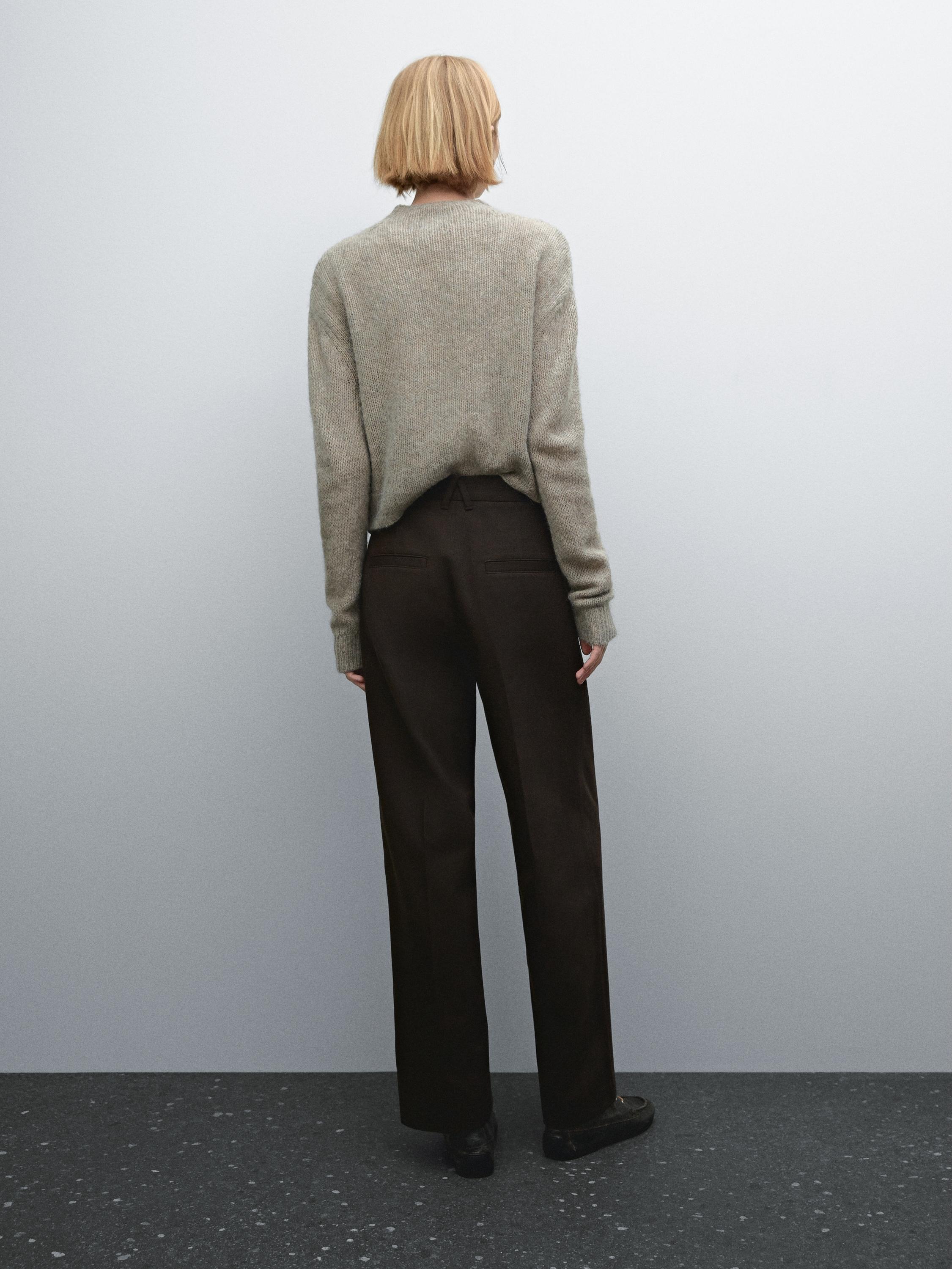 Wide-leg pleated cotton blend trousers