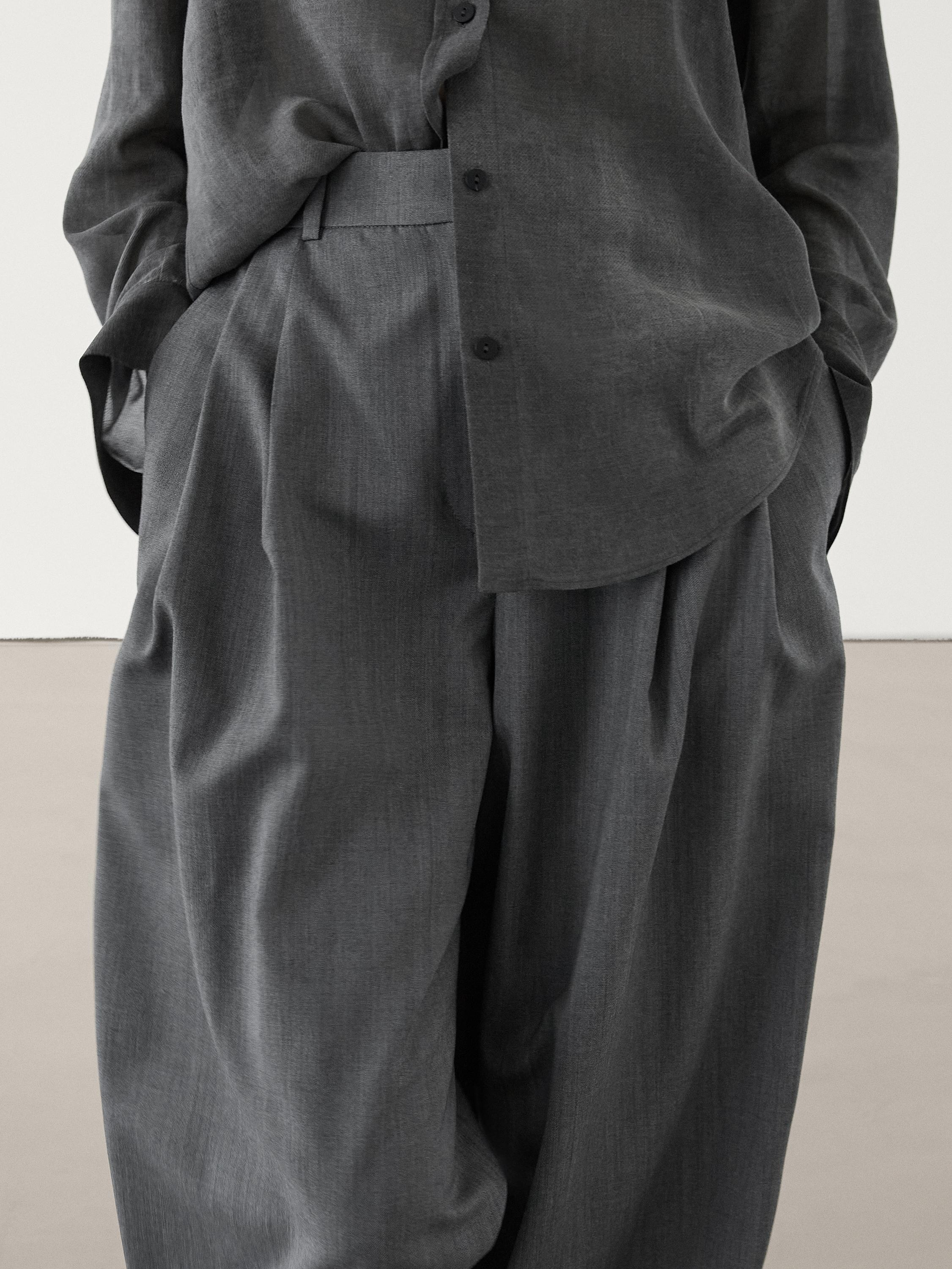 Pantalón straight fit pliegues lana conjunto