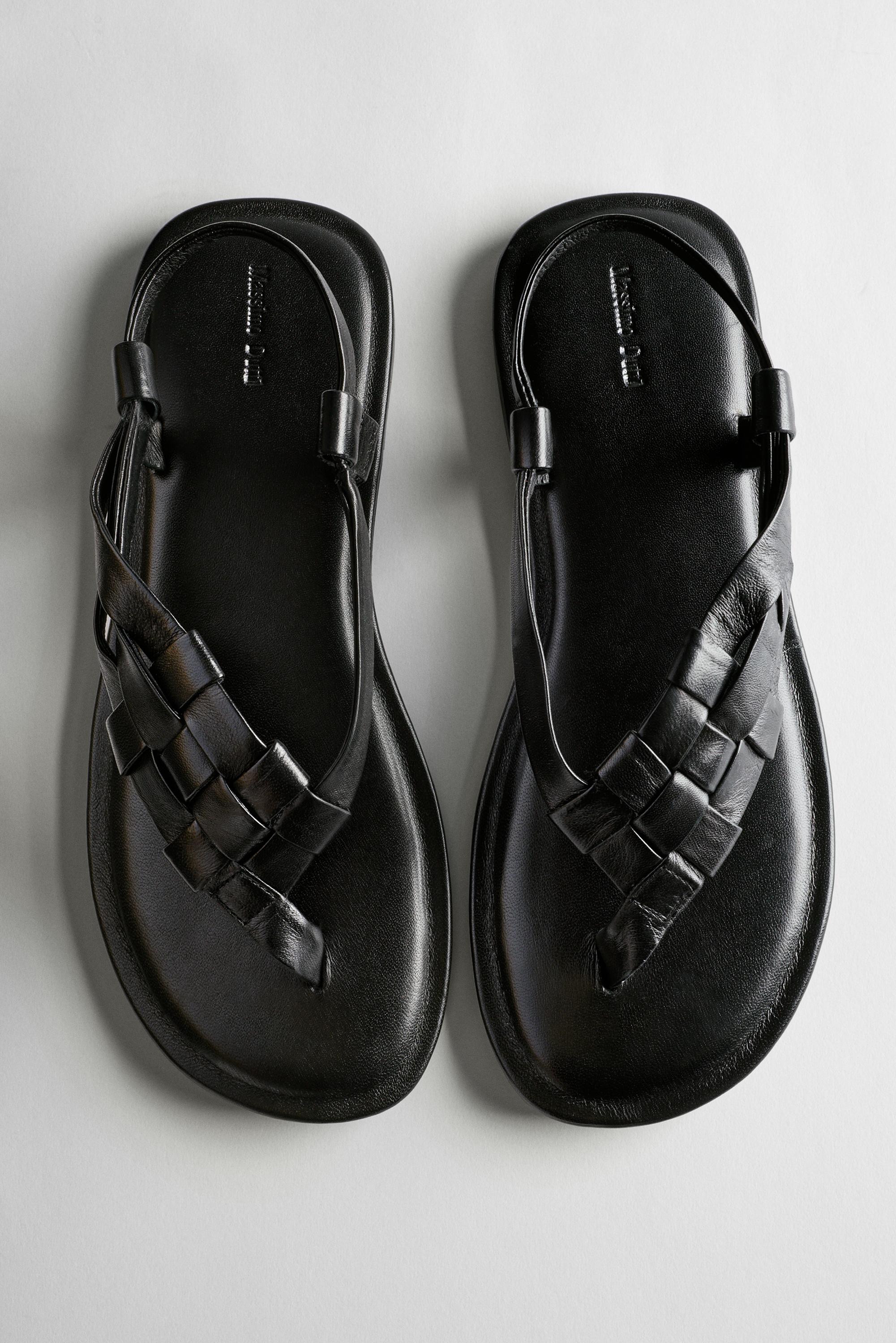 Flat woven leather sandals — BLACK