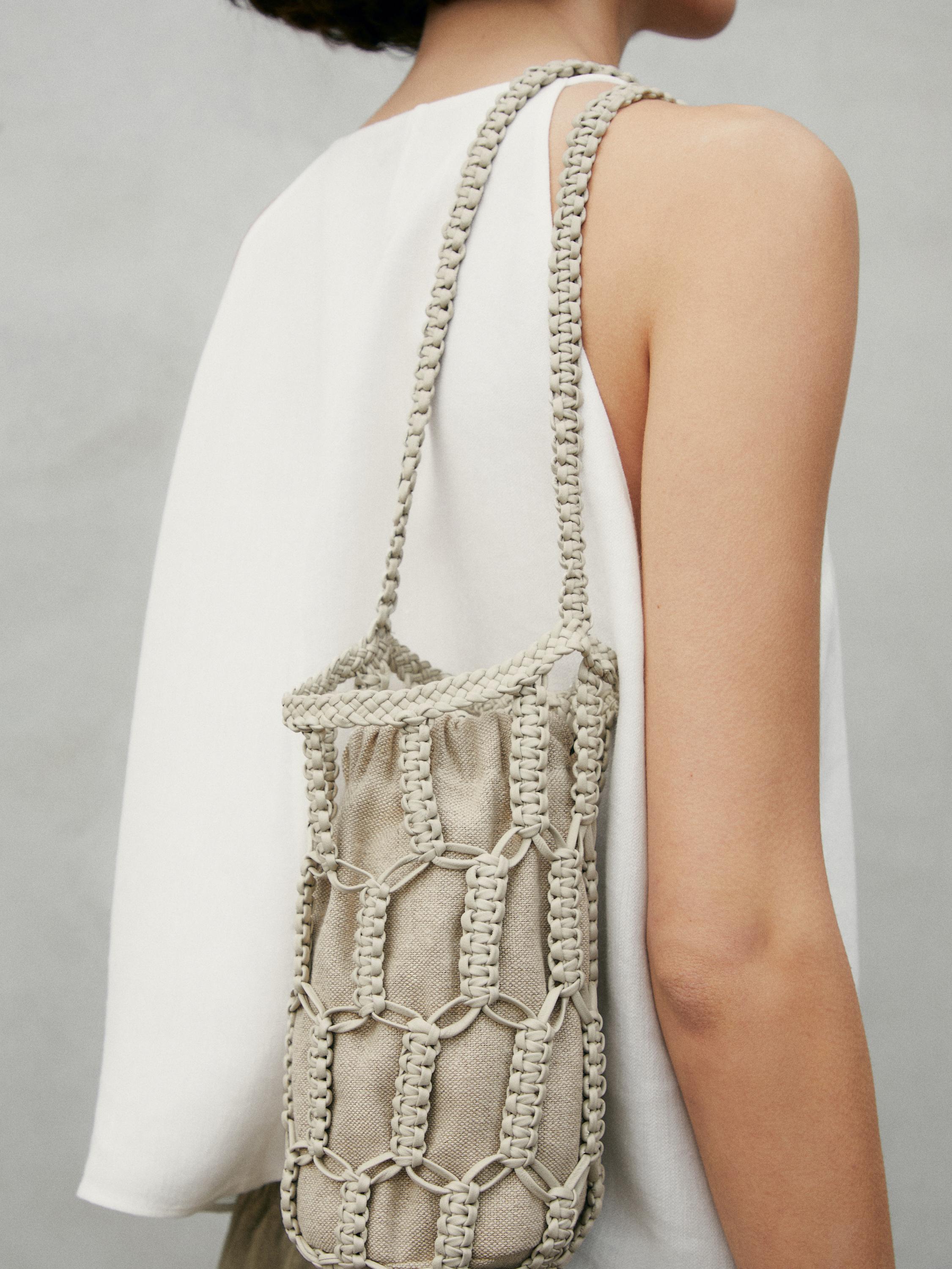 Mini-sac seau tressé en cuir nappa