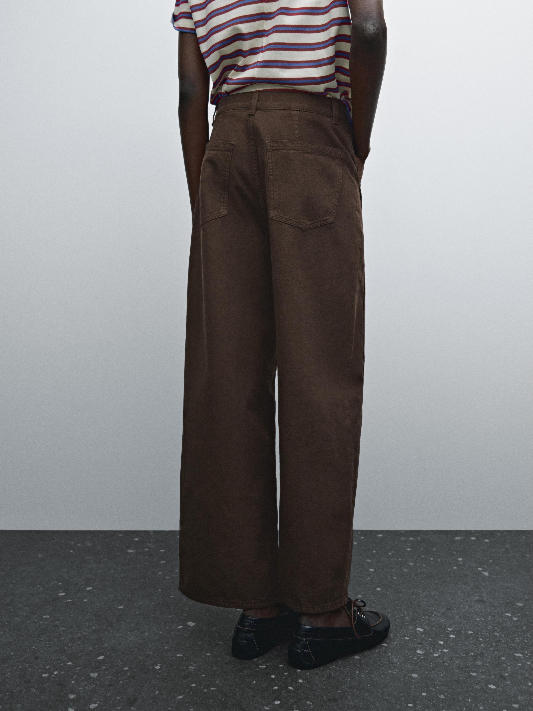 Denim trousers with seam details