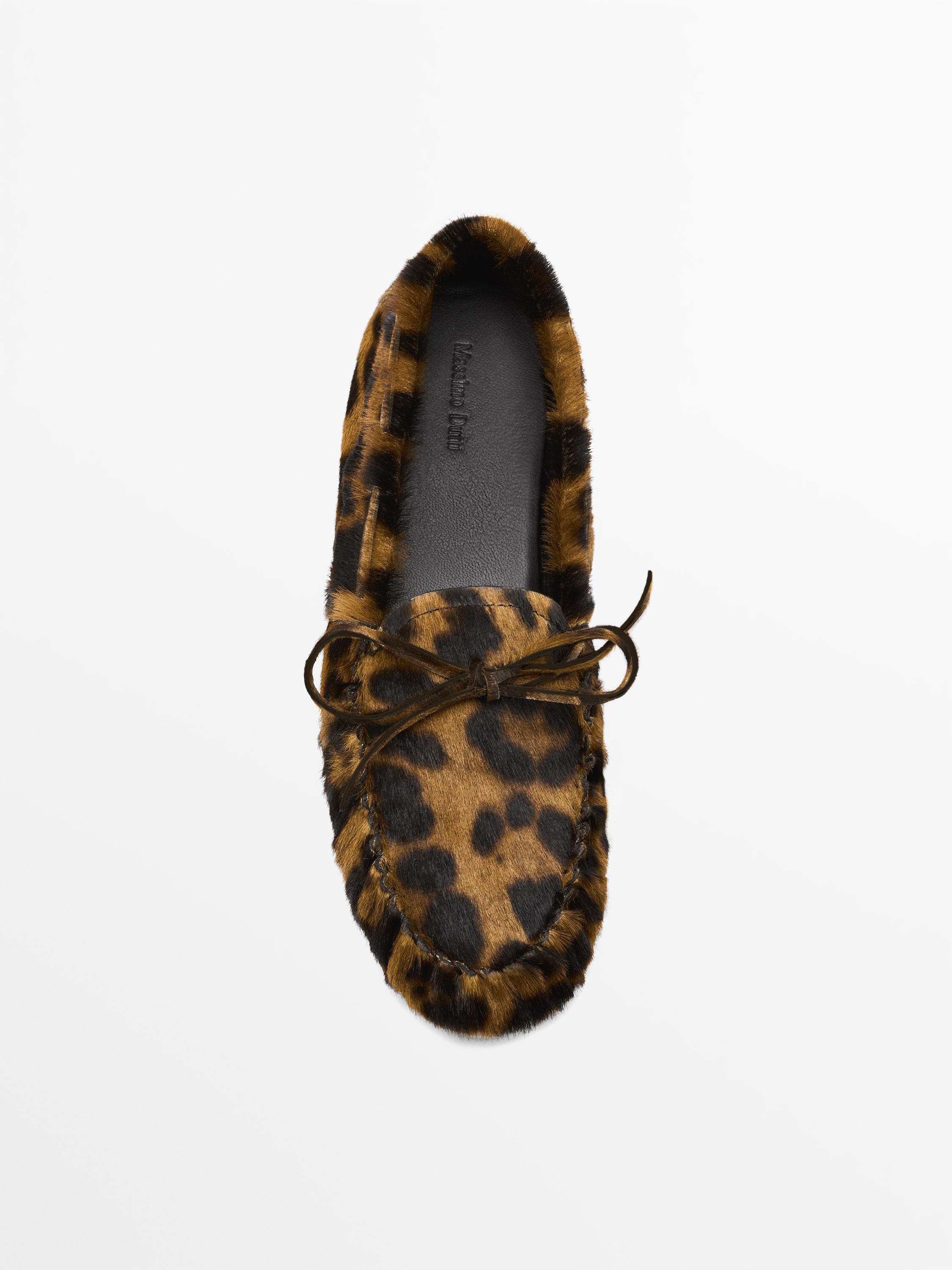 Leopard print deck shoes