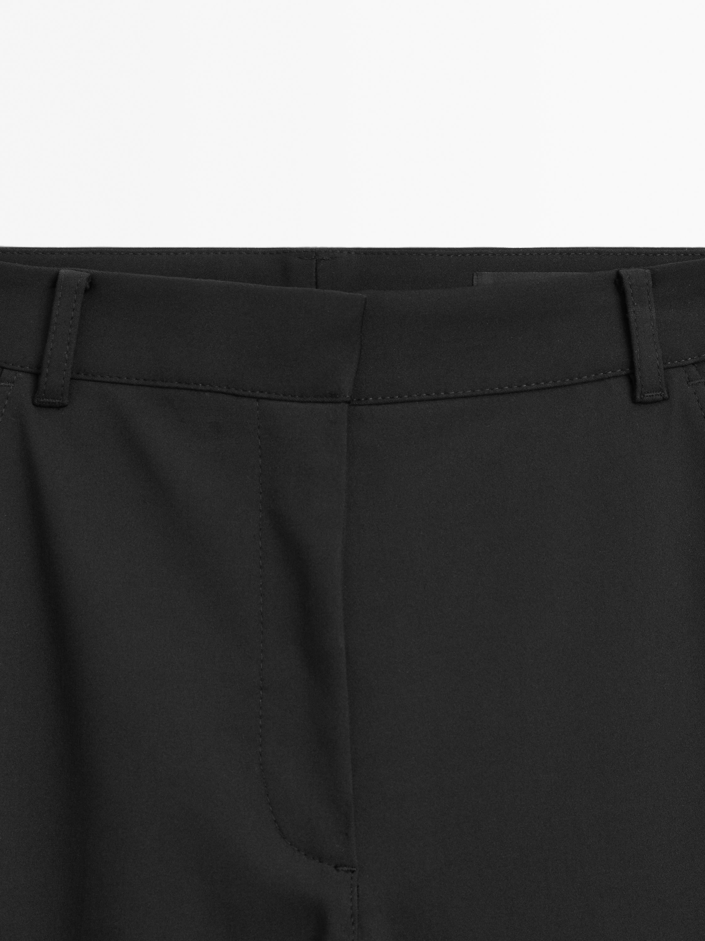 Flared stretch trousers