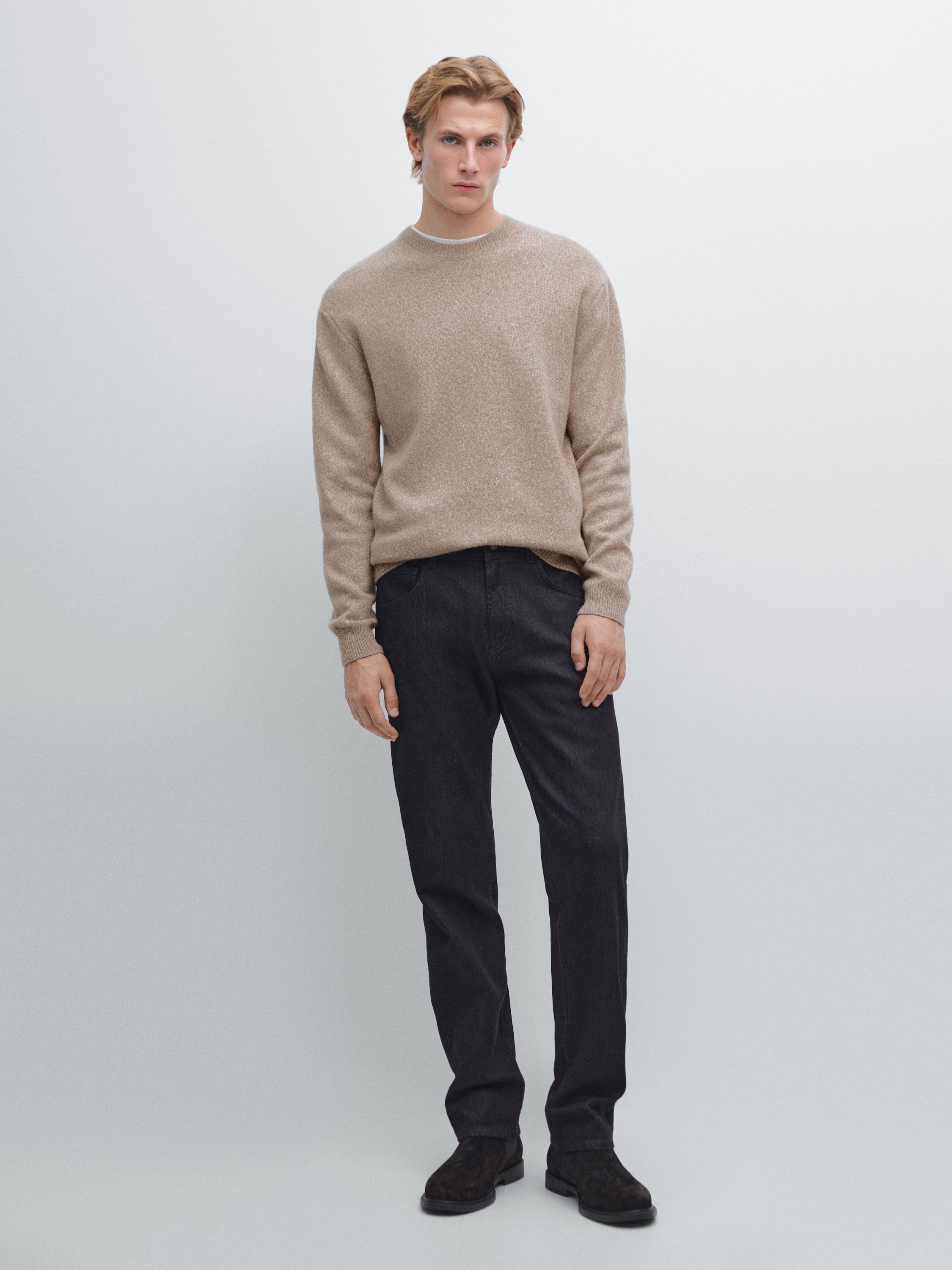 Dumaloq yoqali melanj trikotaj sviter