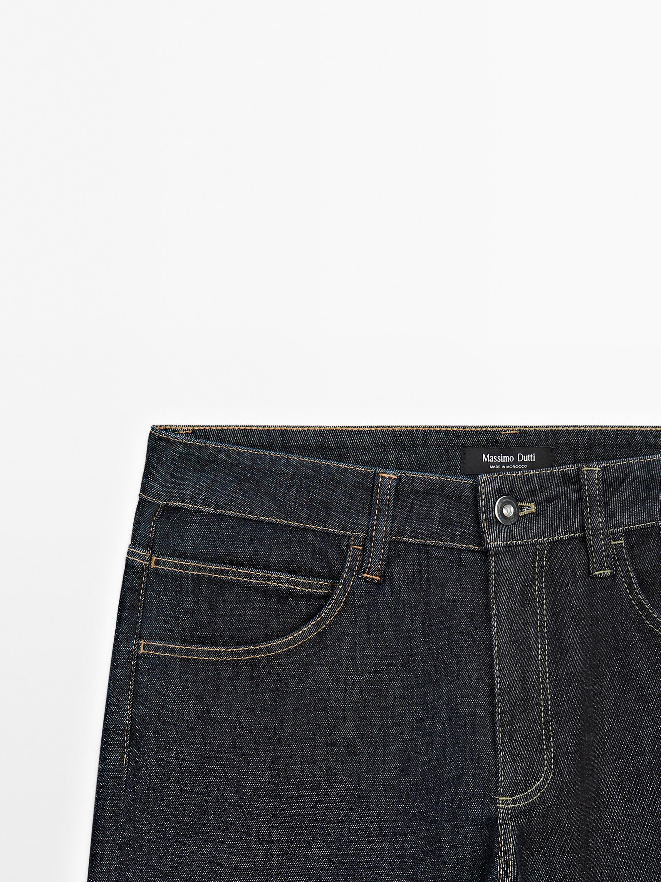 Jean straight taille haute coutures apparentes
