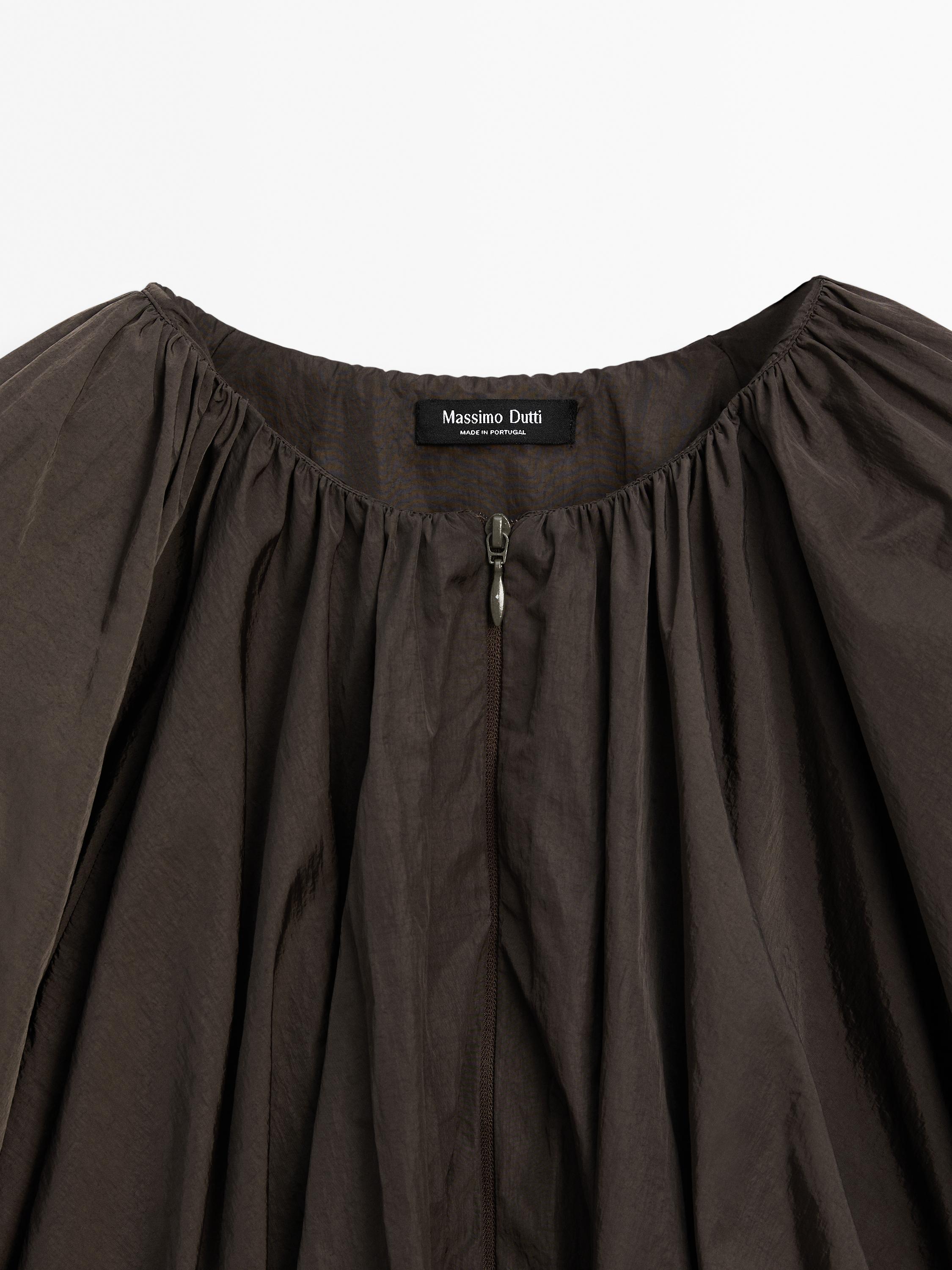 Short pleated bomber jacket