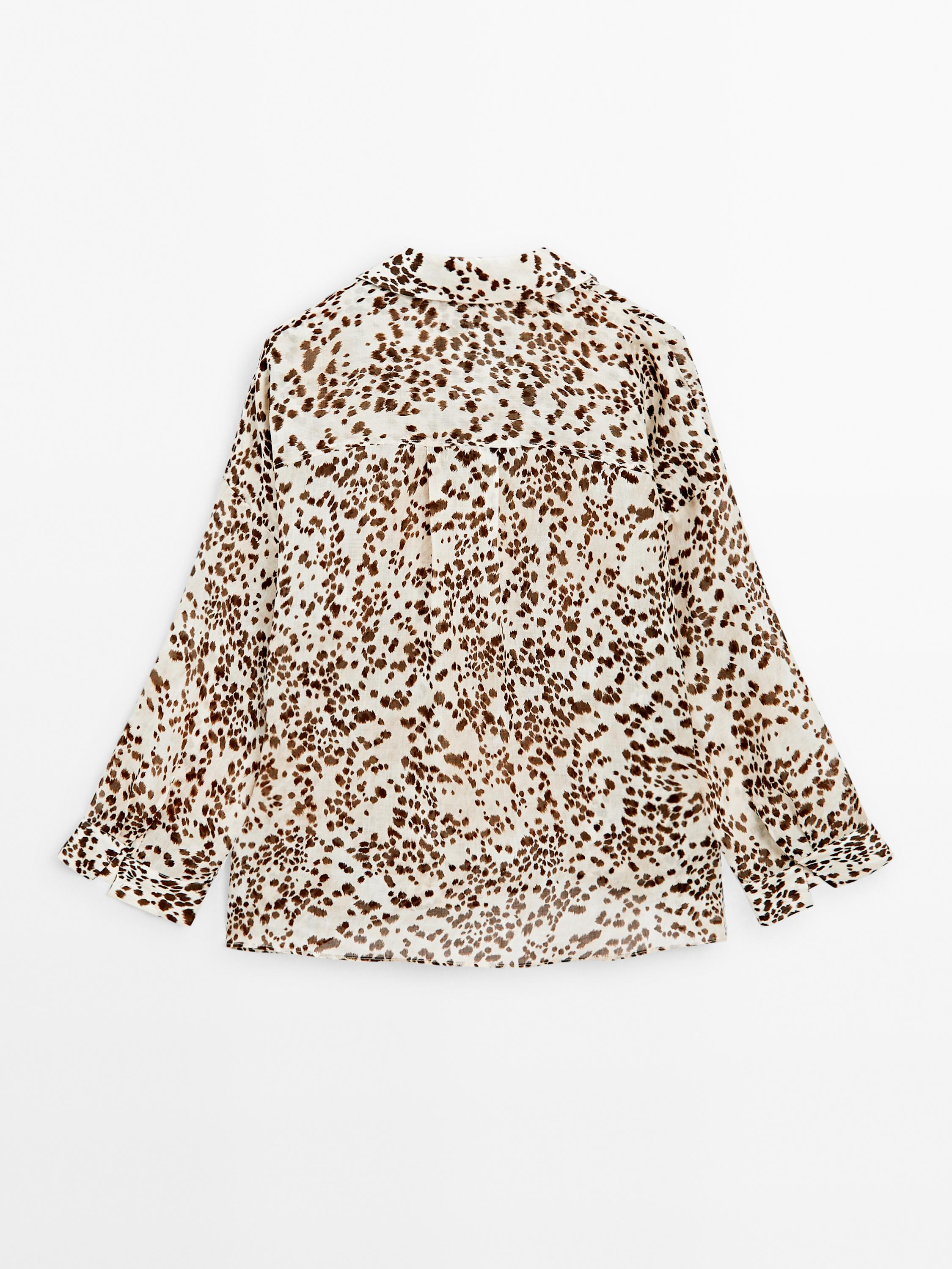 Oversized blouse met dierenprint