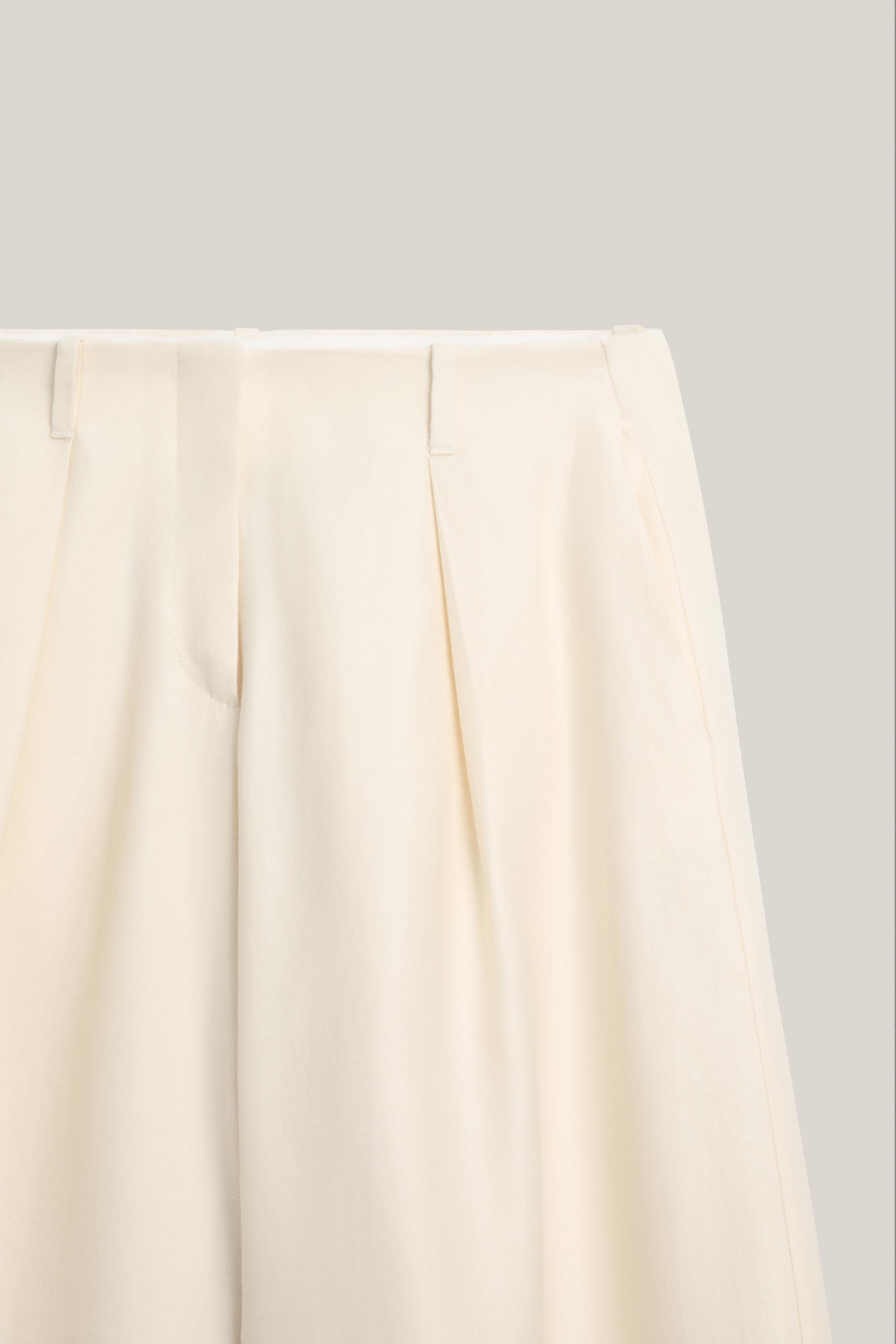 Wide-leg trousers with pleated details - LIMITED EDITION — Off white