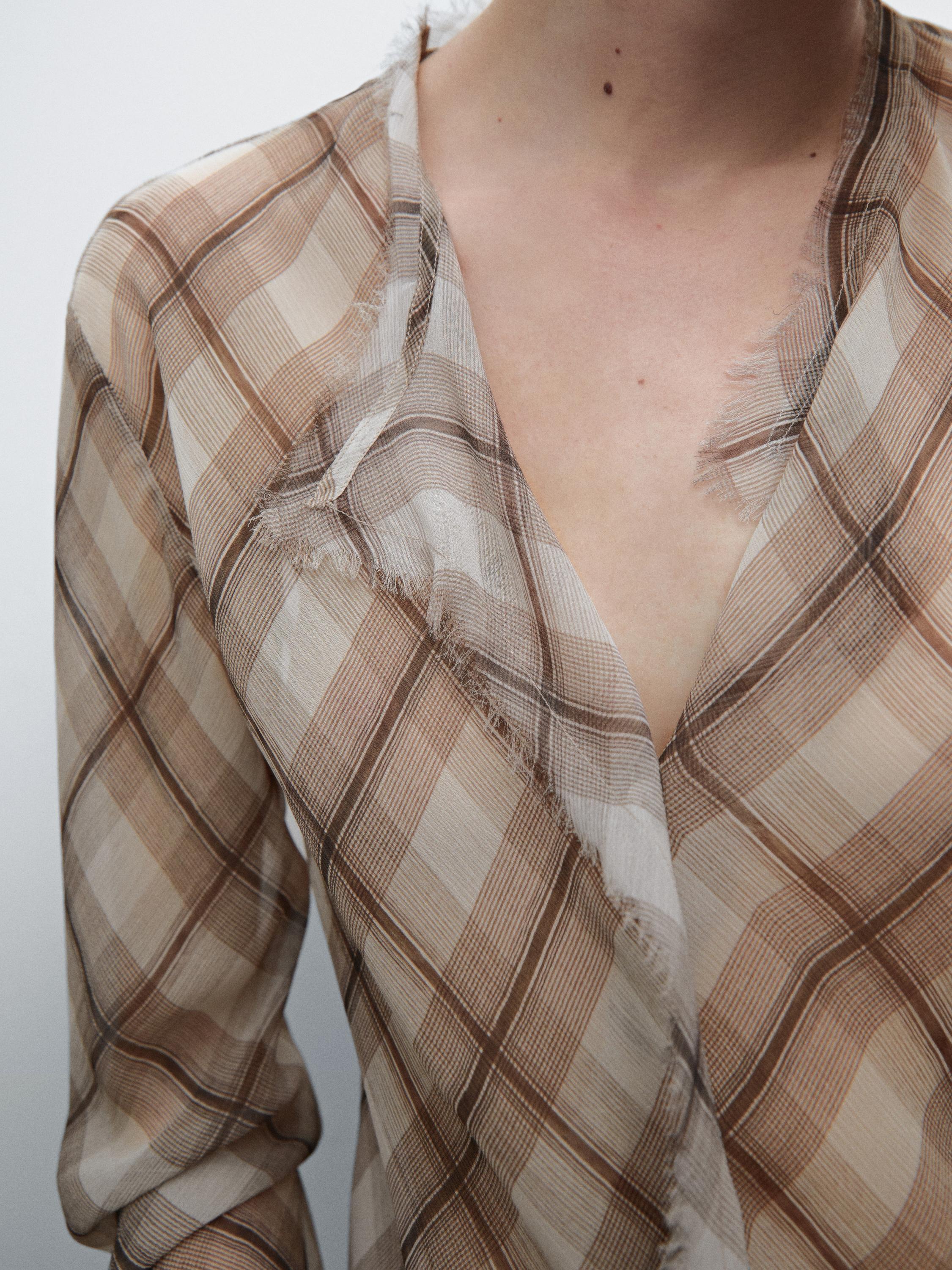 Check shirt with frayed trims