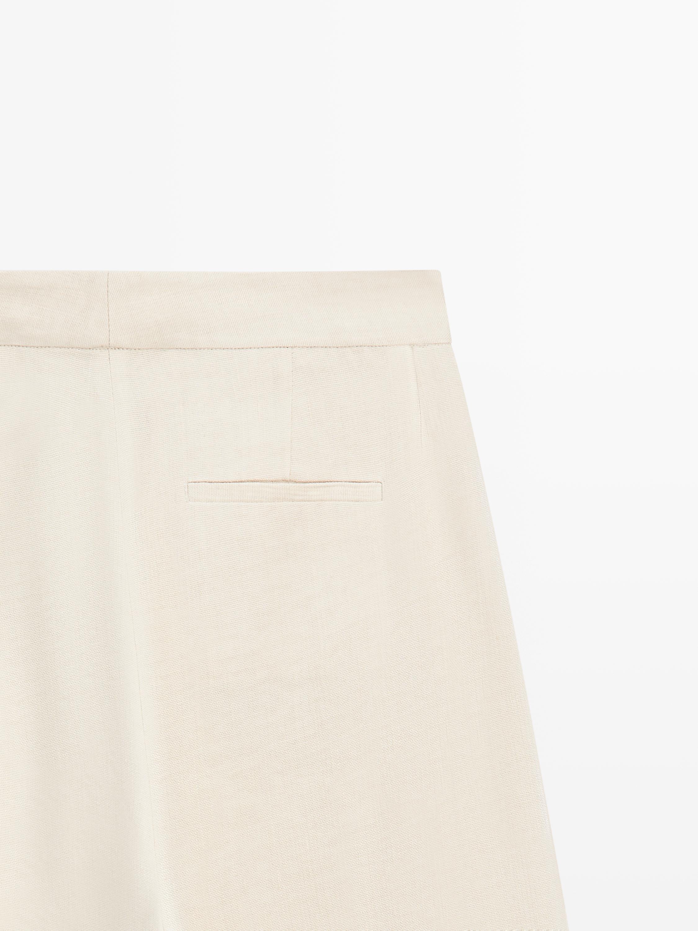 Linen blend suit trousers with button detail — CREAM
