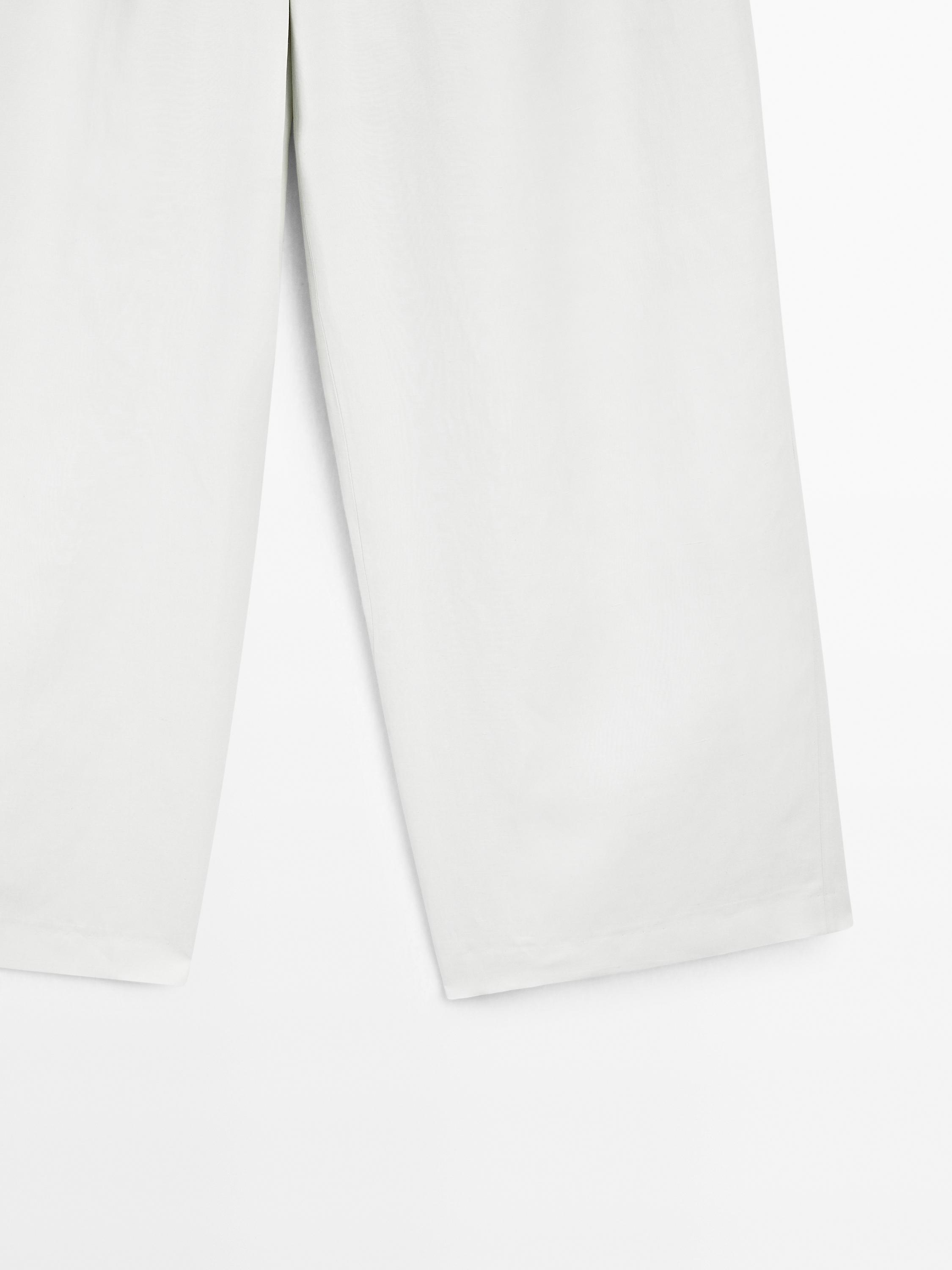 Straight-leg flowing trousers with darts