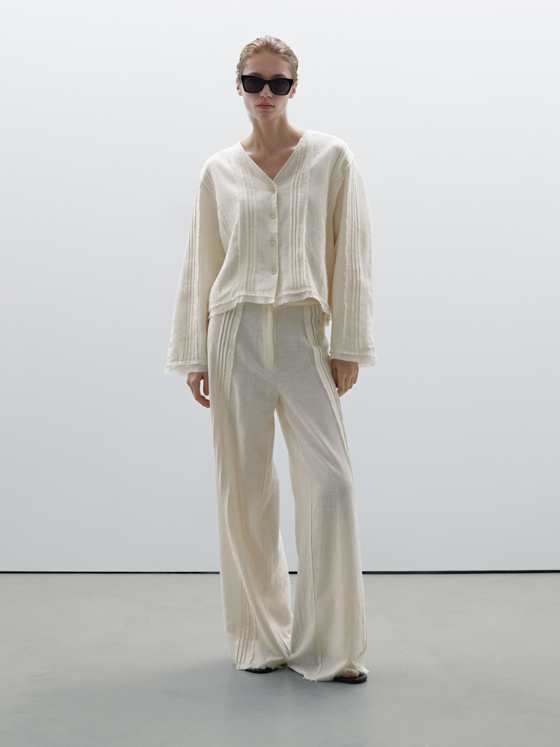 Pantalon avec broderies en coton mélangé