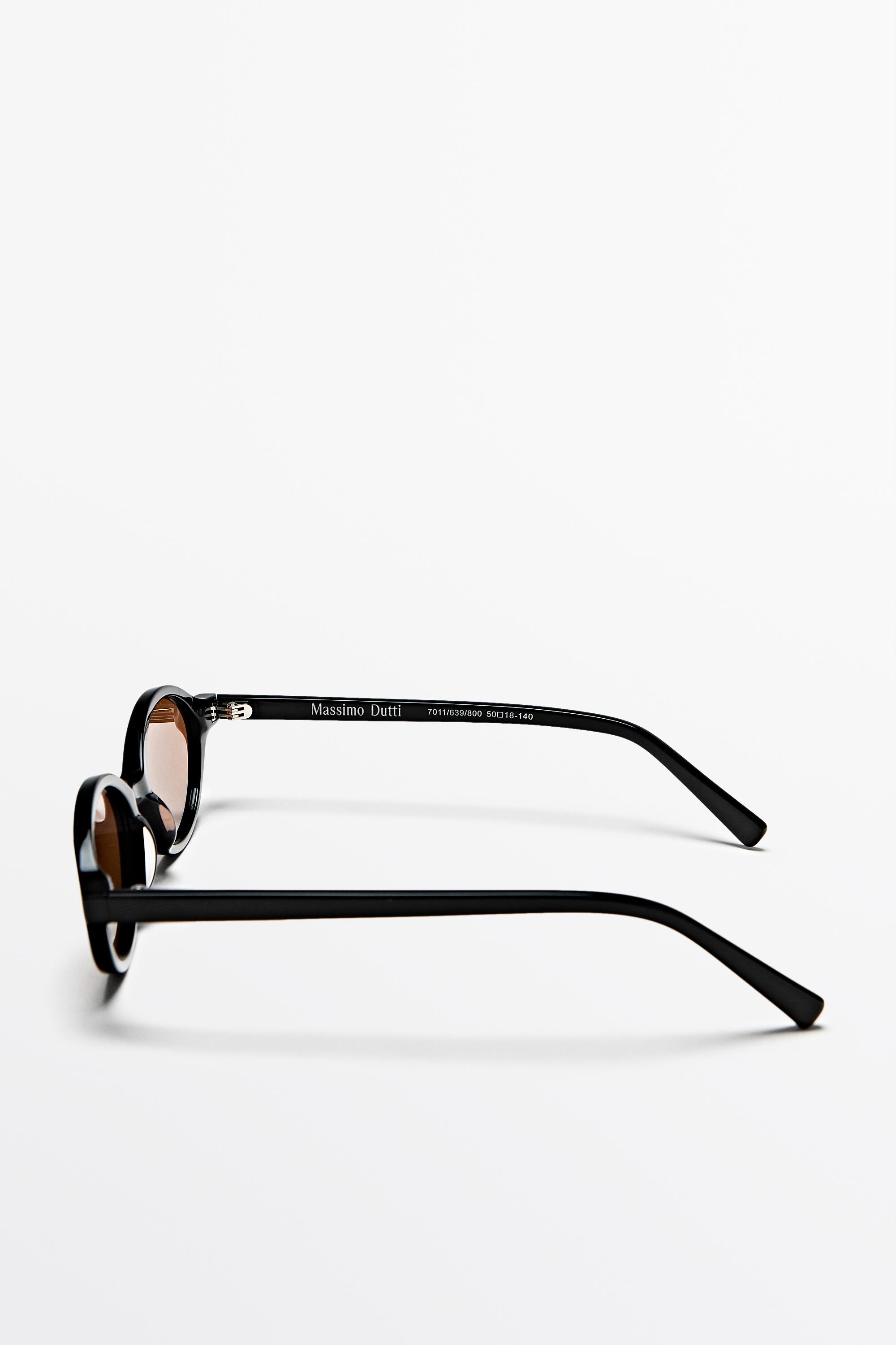 Oval sunglasses — BLACK