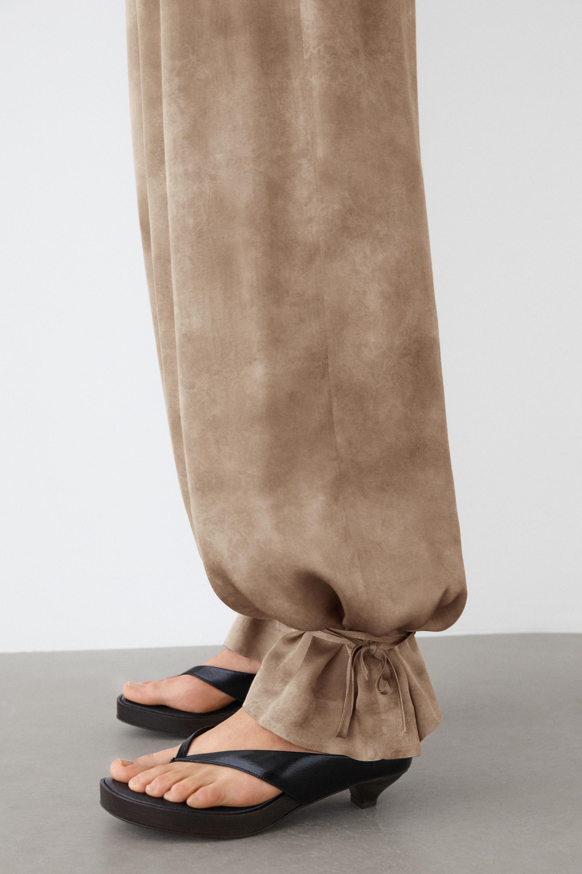 Flowing pants with tie-detail hem — BEIGE