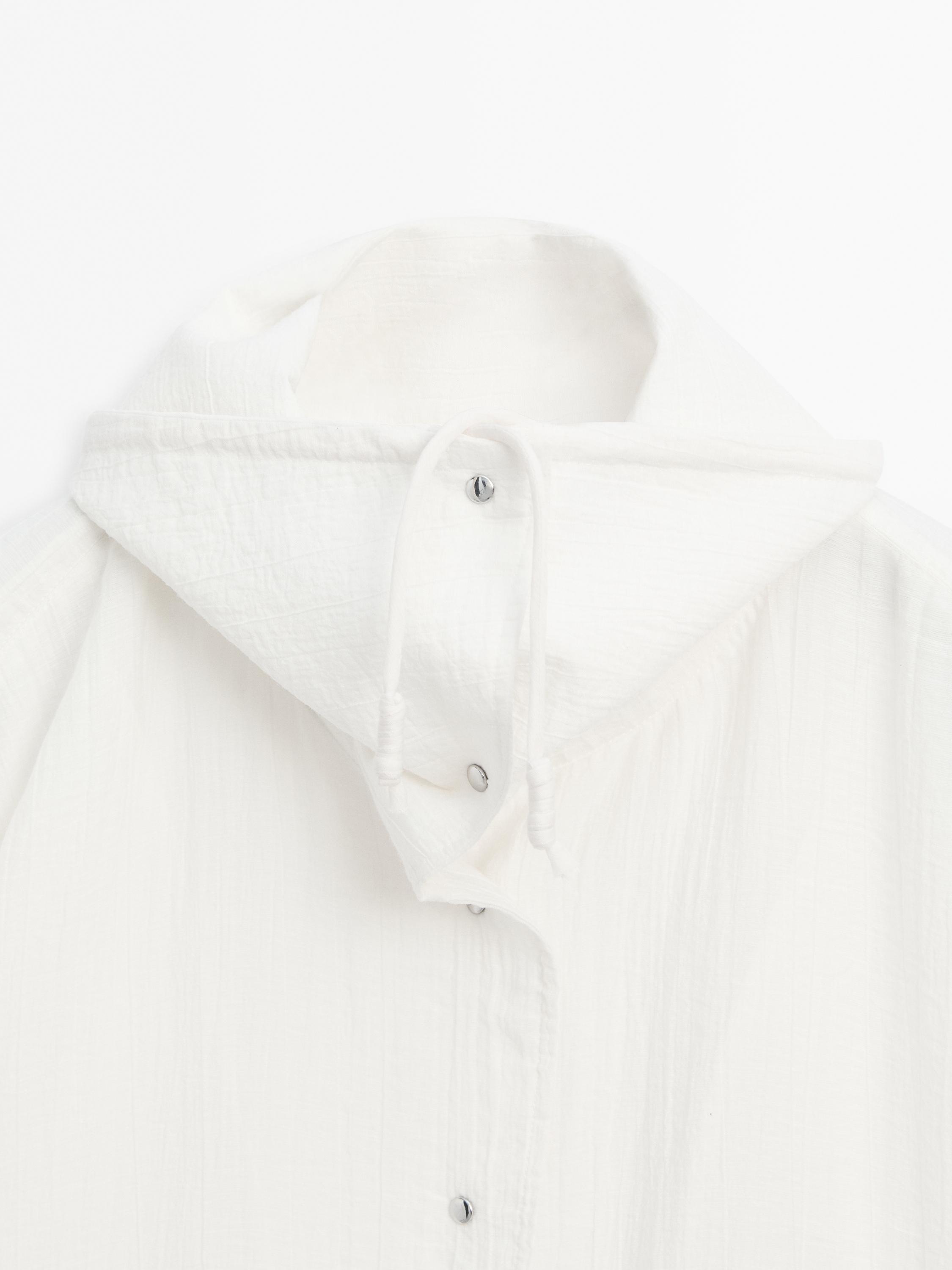 Flowing bomber jacket with voluminous detail