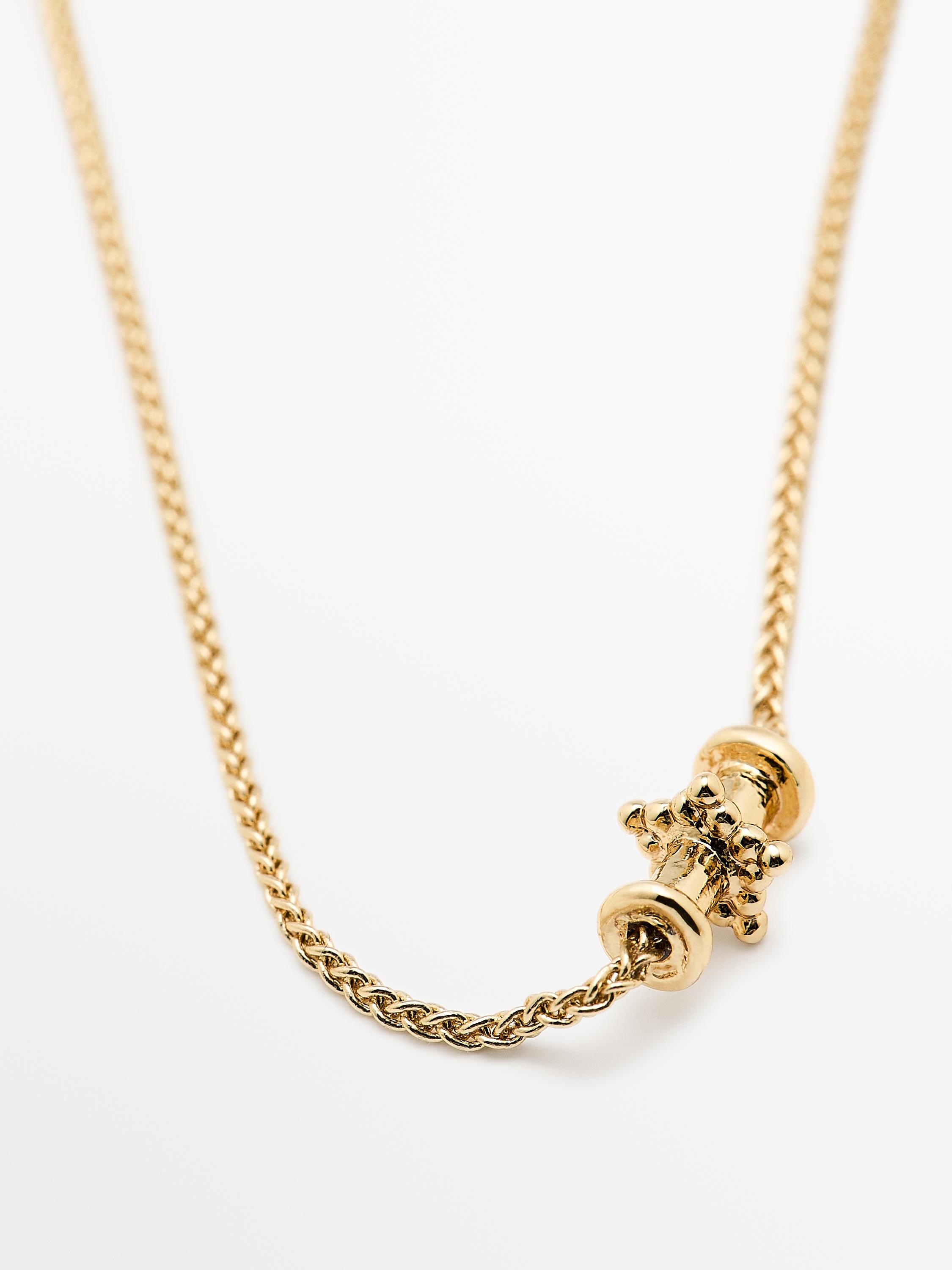 Collana con elementi multi-posizione