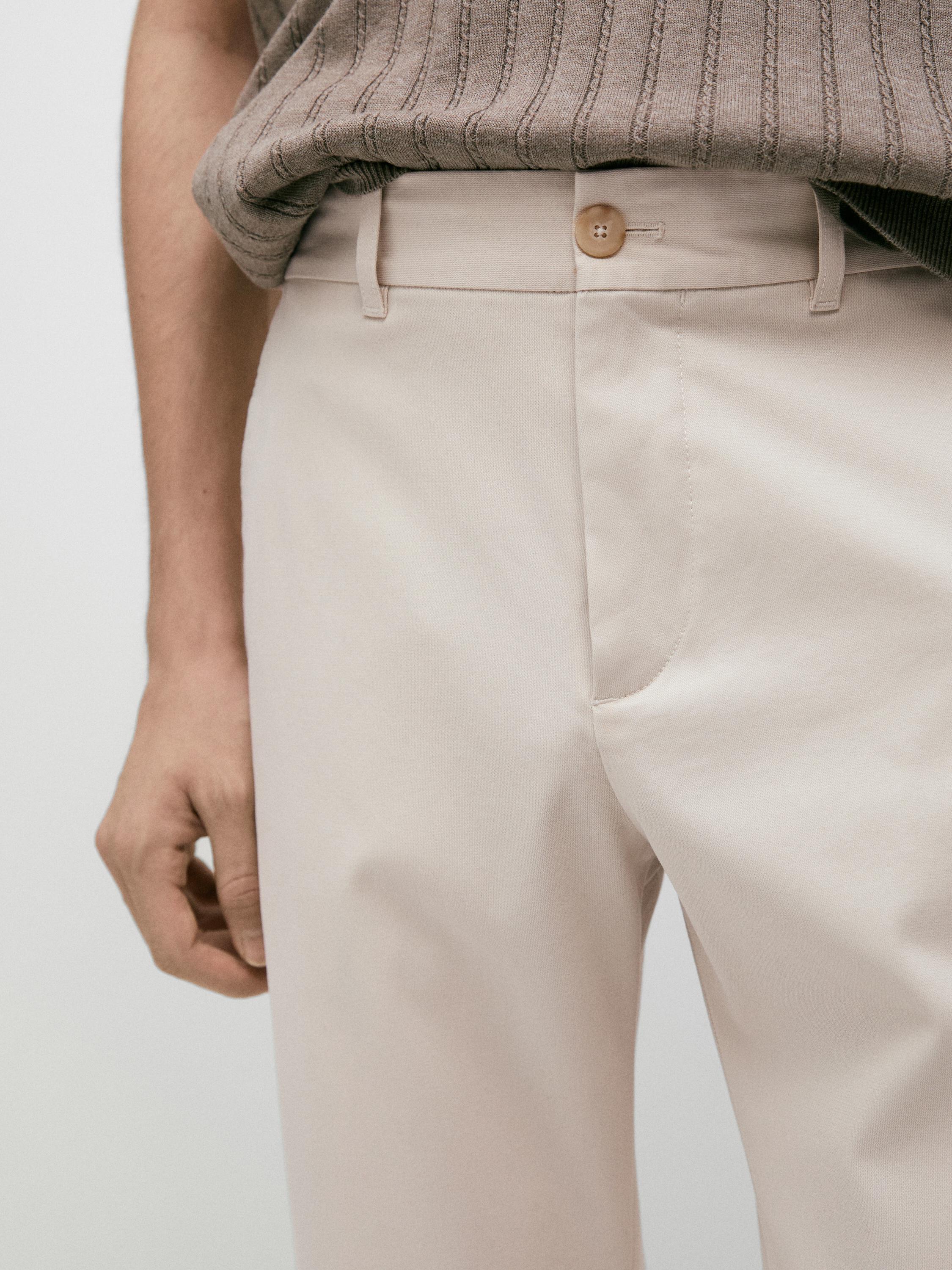Cotton blend tapered fit trousers — BEIGE