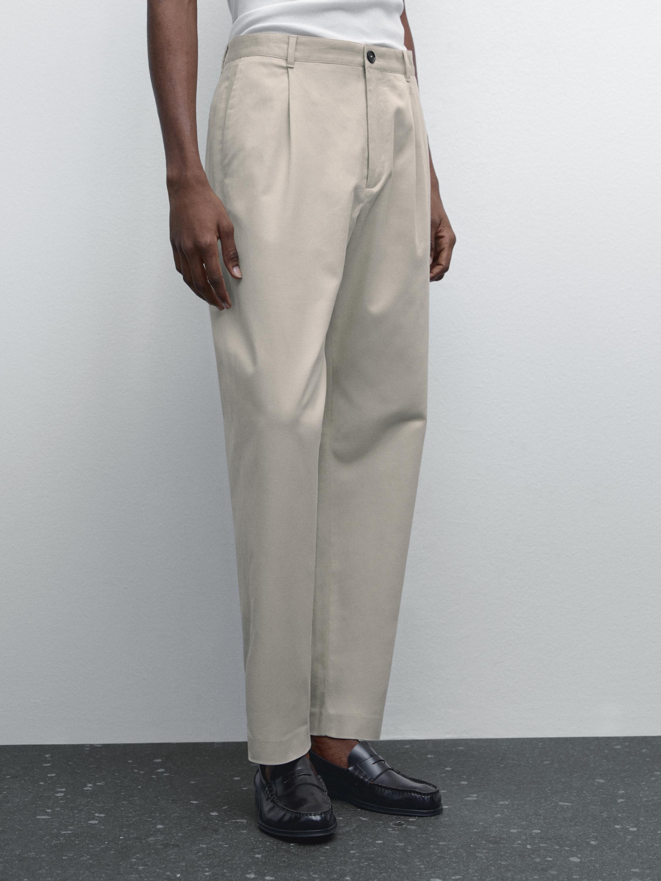 Pantalón straight fit detalle pinza