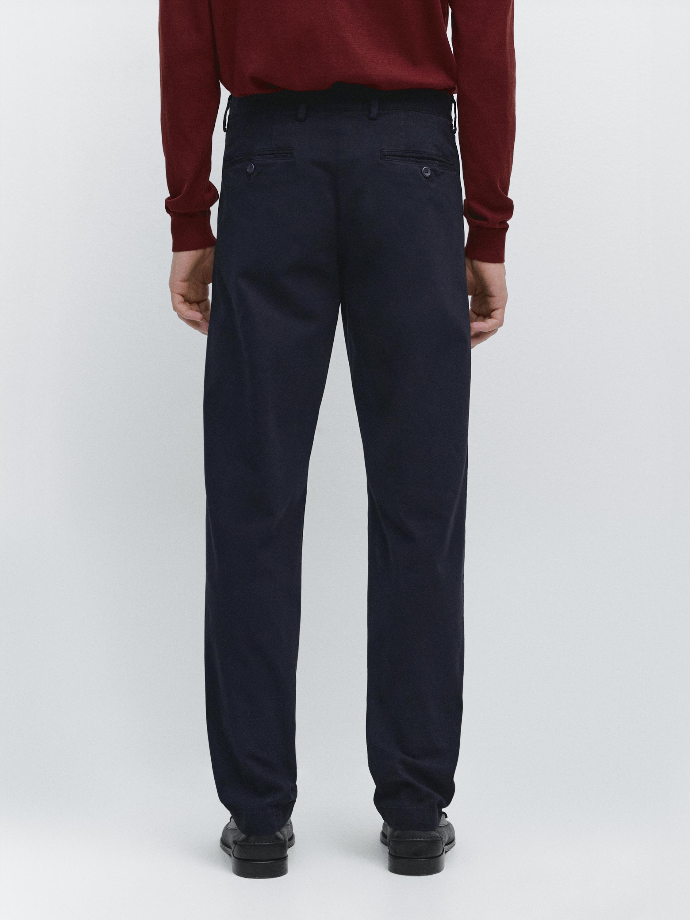 Slim-fit micro-textured trousers — NAVY BLUE